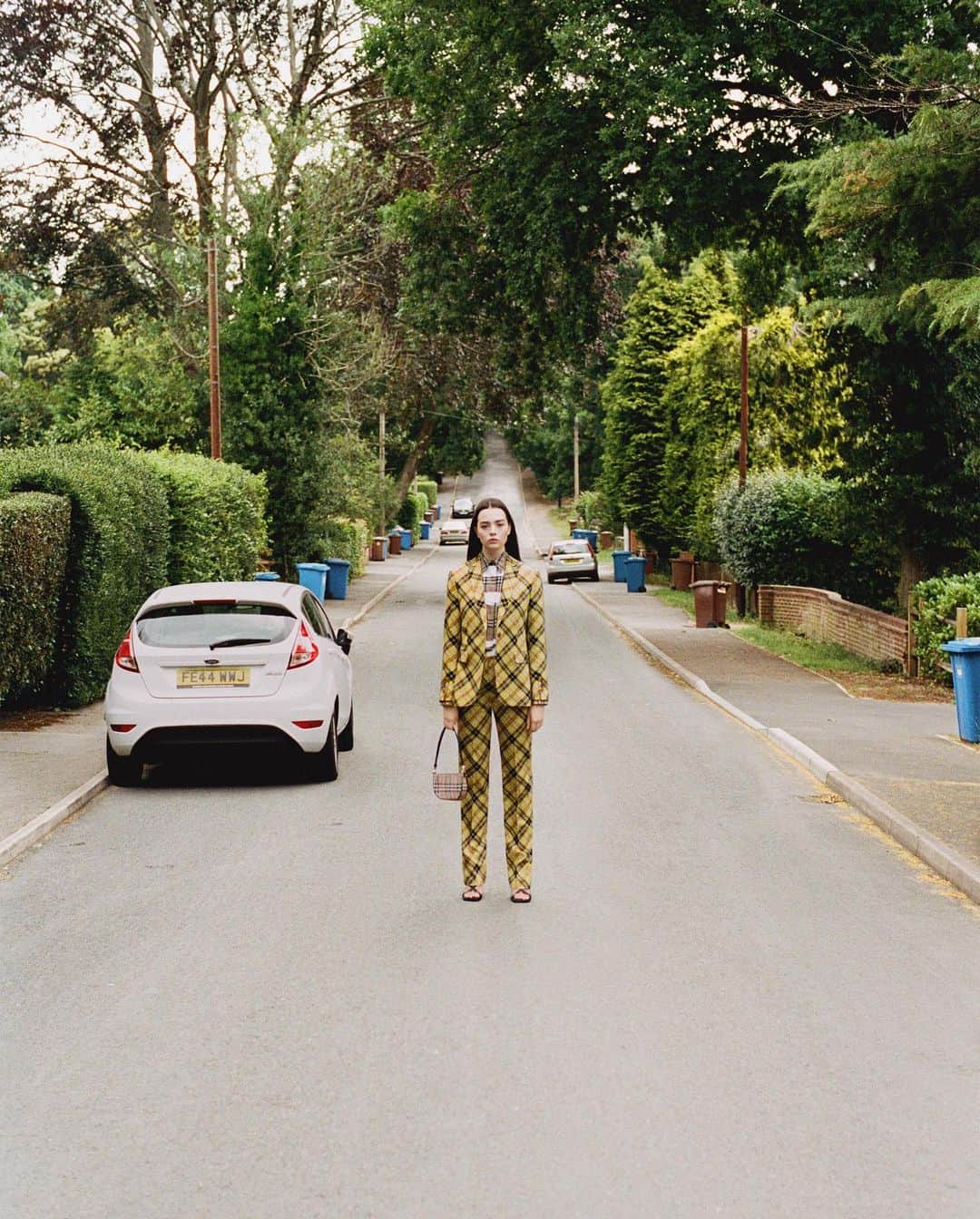 Burberryさんのインスタグラム写真 - (BurberryInstagram)「Beth, Retail, Crowthorne . Introducing the Spring/Summer 2021 pre-collection lookbook, a celebration of our #Burberry community, inspired by Thomas Burberry’s legacy of discovery and the outdoors . Beth wears a marigold yellow check wool suit and love-print shirt with our new Vintage check Olympia pouch and lambskin sandals from the upcoming #BurberryPreSS21 collection, arriving in November .  #Burberry」7月23日 18時00分 - burberry