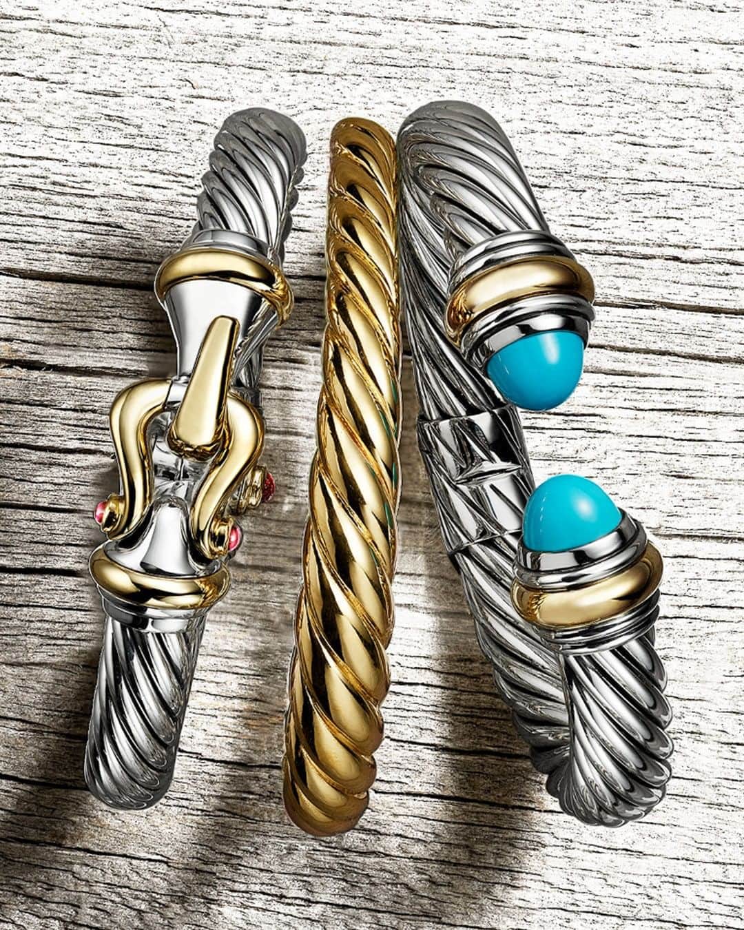 デビッドヤーマンのインスタグラム：「Bolder together. The Buckle bracelet is a #DavidYurman icon—a timeless design that connects the present to our roots, mixing silver and gold in highly sculptural pieces. Style it with Pure Form and Cable Bracelets for a look that’s as daring as you are. #DYRoadTrip」