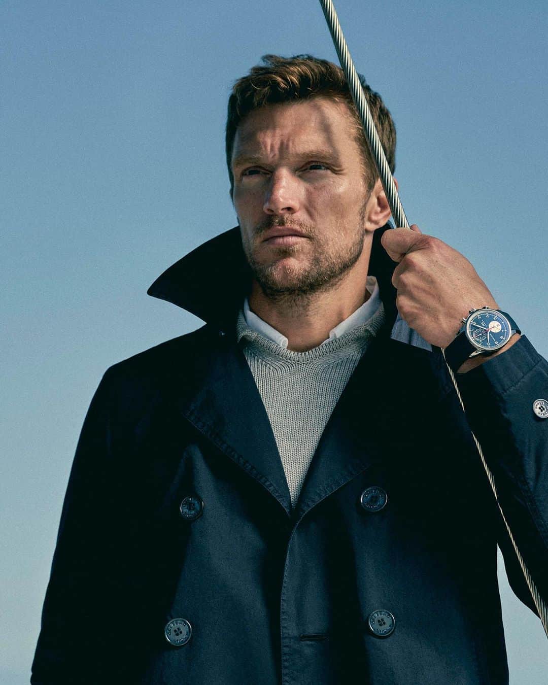 オールバーブラウンのインスタグラム：「Look ahead to the new season with our @iwcwatches navy jacket. Inspired by traditional nautical pea coats, this tailored piece is truly timeless. Tap to shop or explore more of the collection via the link in bio. #IWCxOB #OrlebarBrown #OBsAroundTheWorld #IWCWatches」