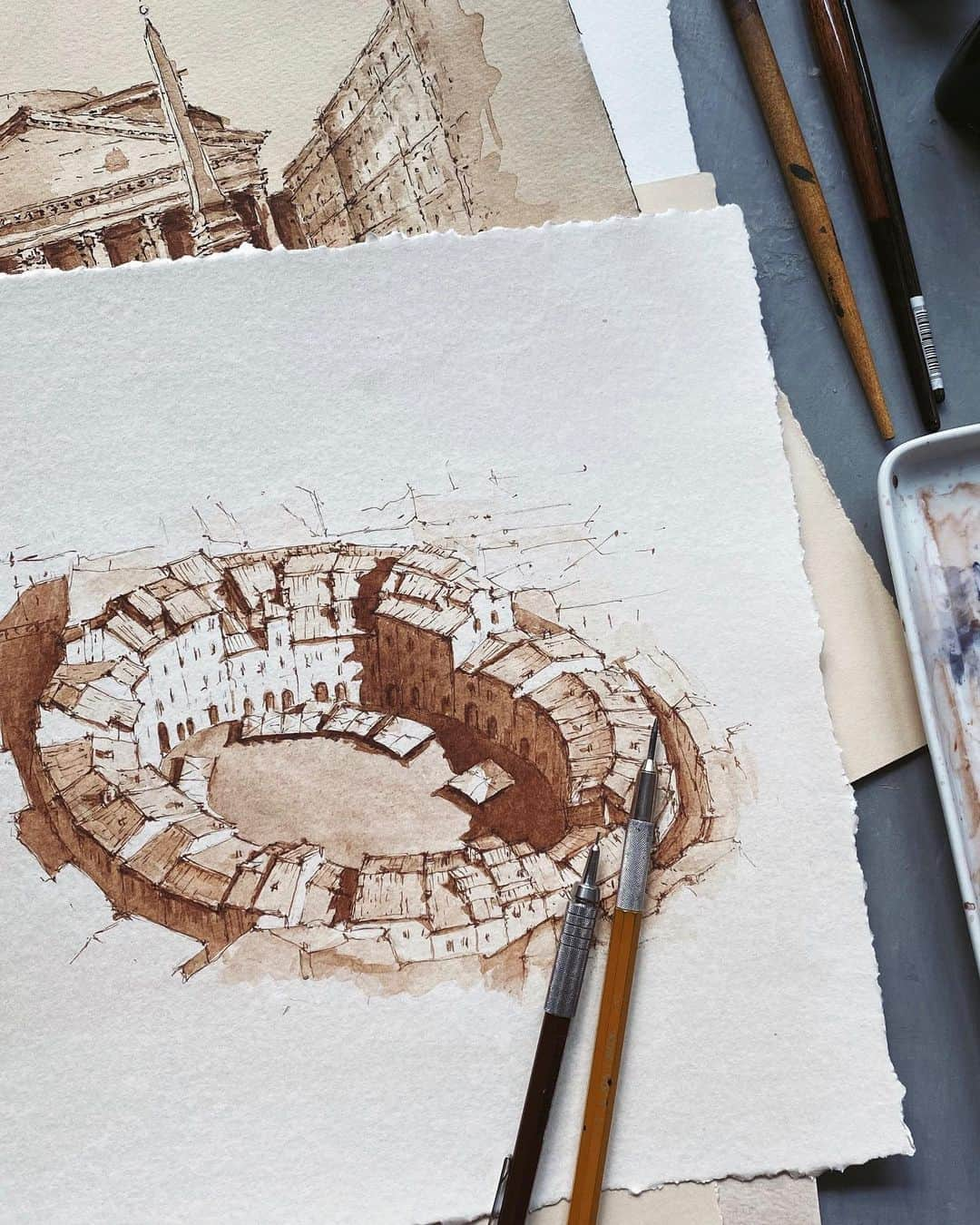 PSNYのインスタグラム：「Piazza dell'Anfiteatro in Lucca. Ink and watercolor on toned paper. Available for sale」