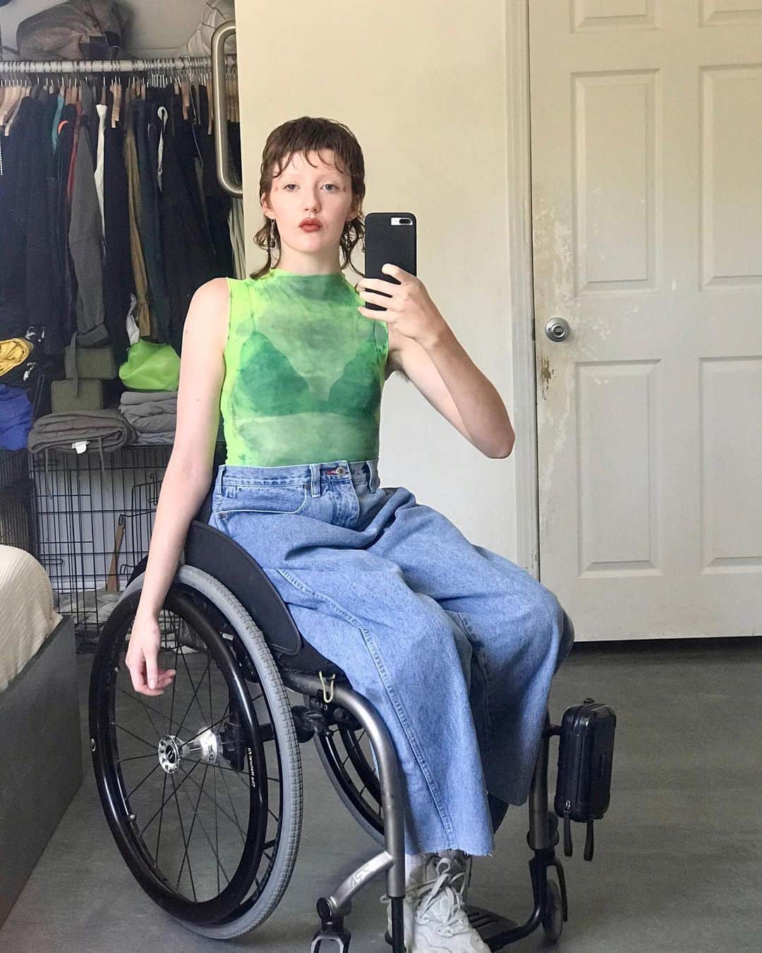 Instagramさんのインスタグラム写真 - (InstagramInstagram)「“If everything was accessible and accommodated for, disability would cease to exist,” says Emily Barker (@celestial_investments). They’re a conceptual artist and an unapologetic, outspoken advocate for people with chronic illnesses and disabilities.⁣ ⁣ “For me personally, as an advocate, activist and cultural theorist, representation isn’t even the bare minimum — but is considered such because it’s easier than solving any of the problems that marginalize disabled people in the first place. Representation doesn’t do much for disabled people when the sidewalks by your house aren’t wheelchair accessible.”⁣ ⁣ Emily’s stylish bedroom selfies subvert expectations, while their unfiltered captions document a lived experience, advocating for the rights of disabled people, pushing for radical change and challenging their (able-bodied) audiences’ perspectives.⁣ ⁣ “I’m not explicitly feel-good,” says Emily, who lives with incomplete paraplegia and comorbid CRPS, an extremely painful chronic disease. “I expect a lot from my followers, but the pros to this method outweighs the cons, because the people who unfollow and disengage are people who’d never seek to change their perspective on disabled people in the first place because it makes them too uncomfortable.”⁣ ⁣ “I’ve reclaimed [the word] cripple for myself, because that’s literally what I am. Some people will want to be called a person with a disability, which is their right. Disability is a spectrum. But everyone can refer to me as Emily.” #ThisWeekOnInstagram⁣ ⁣ Photo by @celestial_investments」7月21日 1時19分 - instagram