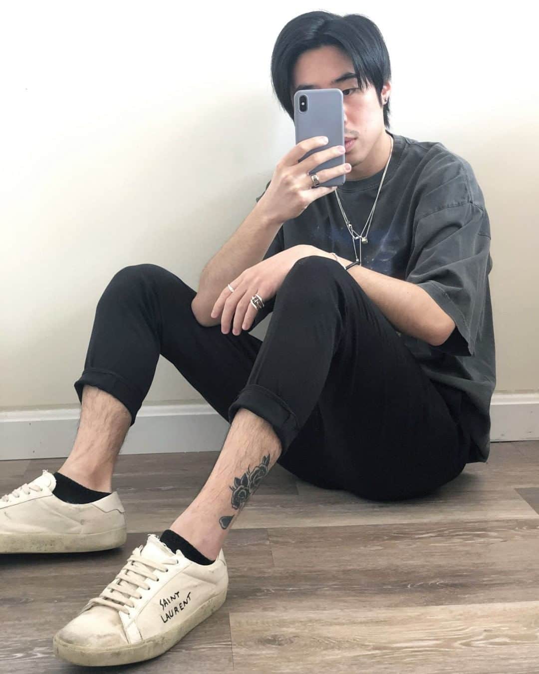 GILTのインスタグラム：「INSIDER LOOK: White trainers are a must. Keeping them white? That’s optional. @Gaokwen’s pair of #SaintLaurent sneakers give his look a personal touch. Shop his style in the link in bio.」
