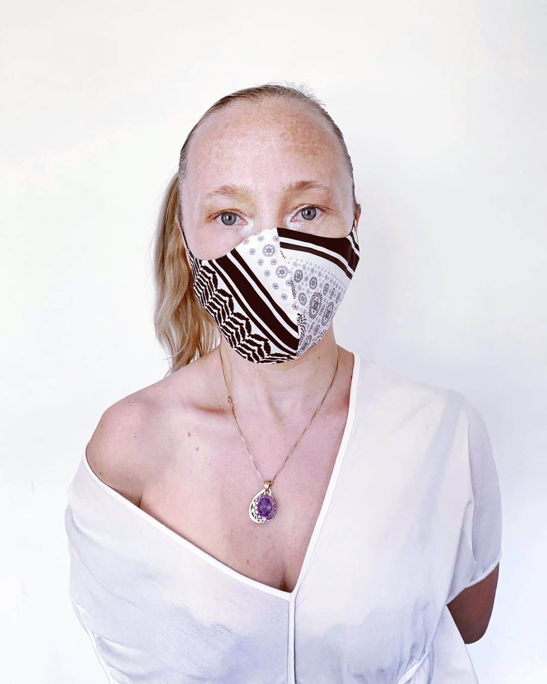 スリーアズフォーのインスタグラム：「New Versions of “inSALAAM inSHALOM” Masks are NOW available in limited edition on our shop! Featuring Ange @angelunaluna  in BLACK inSALAAM inSHALOM” a print from 2012 collection "inSALAAM inSHALOM", celebrating the textiles of both Arabic and Jewish cultures by mixing the geometric patterns of the TWO worlds and uniting them as ONE !  We are donating 10% of each purchase towards creating medical masks for  the support of the health community in New York City  All masks are limited edition - One of A kind ! #mask #facemask」