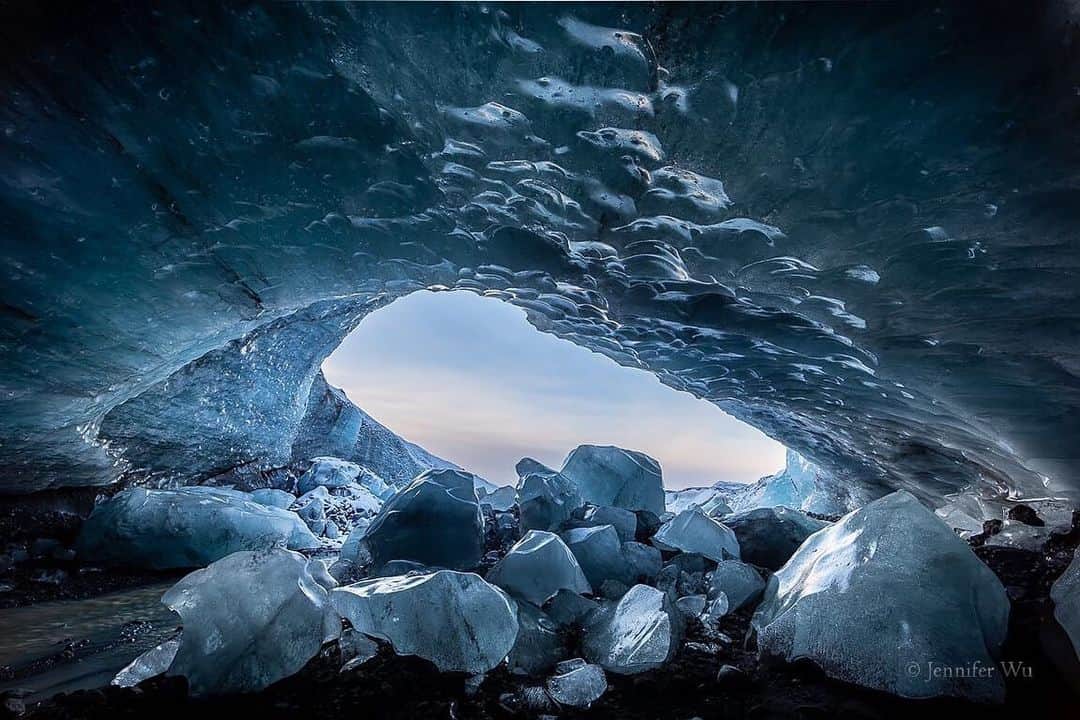 CANON USAさんのインスタグラム写真 - (CANON USAInstagram)「Photo by #CanonExplorerOfLight @jenwuphoto "Walking into the ice cave, I turned around to see this view of the blue icebergs as I looked outside. The walls were melting and it felt like a light rain as drops of water fell on me. I used a polarizer to reduce some of the reflections, however you can still see some of the shimmery surface of the melting ice on the boulders and walls. I wanted to photograph a wide view of the cave so I selected the 14 mm wide-angle lens and chose f/11 for plenty of depth of field."   Camera: #Canon EOS-1D X Lens: EF 14mm f/2.8L II USM Aperture: f/11 ISO: 100 Shutter: 1/60 sec Focal Length: 14mm」7月22日 0時25分 - canonusa