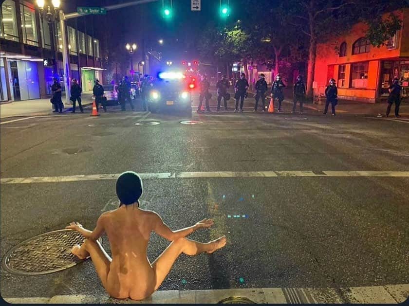 トームさんのインスタグラム写真 - (トームInstagram)「The power of the Vulva  . REPOSTED AFTER INSTAGRAM REMOVED IT, so please support the vulva by SPREADIN IT! Lol   @danfortner2020 This is naked Athena of Portland last night [july 18] during the 50th day of protests against #PoliceBrutality. Police justified their escalation of force by claiming protesters had weapons. Naked Athena showed them the weapon she was holding and the police backed off... #pdx  Becca Dakini wrote this: The power of the Sheela Na Gig, or Anasyrma - The woman lifts up her skirt   Anasyrma is literally “the exposing of the genitals.” This is a form of exhibitionism found in religion or artwork, rather than a display for arousal, and it refers always to the act of a woman exposing herself.”  From the earliest historic age, there are references to goddesses who are whimsical, erotic, and ferocious. The first texts of this sort have their provenance in the Near East; the female ﬁgures described in these texts are erotic, but they do not appear in the “magical” crouching or dancing positions evinced by their Neolithic predecessors.  The act of lifting up one’s skirt to display the genitals can be an apotropaic device. (A type of magic intended to turn away harm or evil influences). It can, in circumstances of war, evoke the fear of the enemy. It can also be an act which evokes surprise and subsequent laughter and a letting go of sadness.  A symbol of power and magic The ritual of anasyrma is also found in Japanese myth. The Japanese goddess Amaterasu, after withdrawing to a cave in anger, was coaxed out by the dance and display of the goddess Ame-no-Uzume no Mikoto, “the Terrible Female of Heaven.” The goddess Hathor lifts up her skirts, displaying her “nether parts” to the sun-god, thus making him laugh—that is, thus taking away his grief. Throughout time, the vulva has been a symbol of power and magic. Again, a plethora of female nakedness can overcome even the mightiest warrior.  👊  https://www.maier-files.com/the-power-of-the-vulva/」7月22日 5時28分 - tomenyc