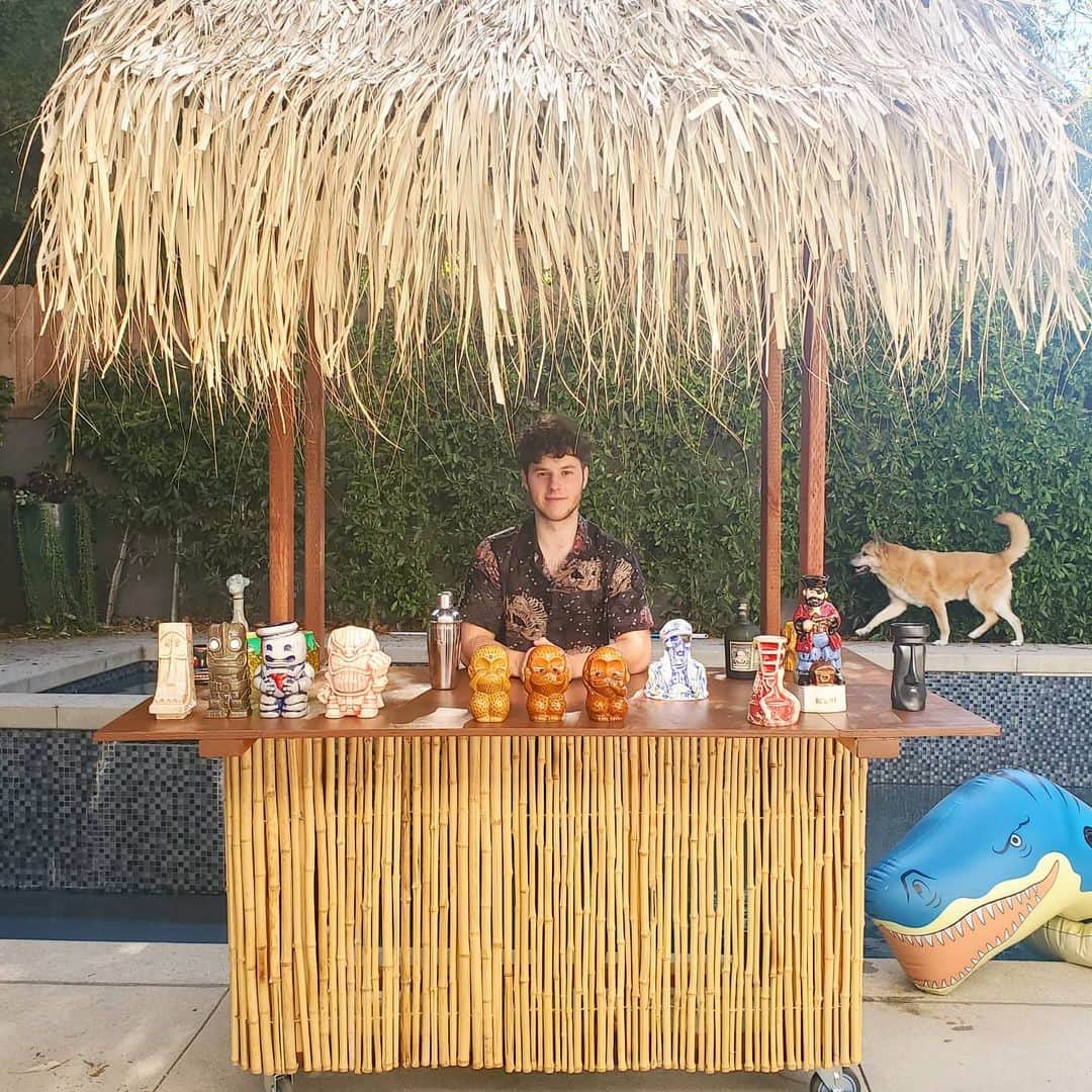 Nolan Gouldのインスタグラム：「Who's thirsty? Spent most of quarantine hand building a tropical bar in my backyard. I've never built anything before but I woke up one day and decided to try it. Now please wear a mask so that someday I can finally have people over to use it 🍹🧉🏝」