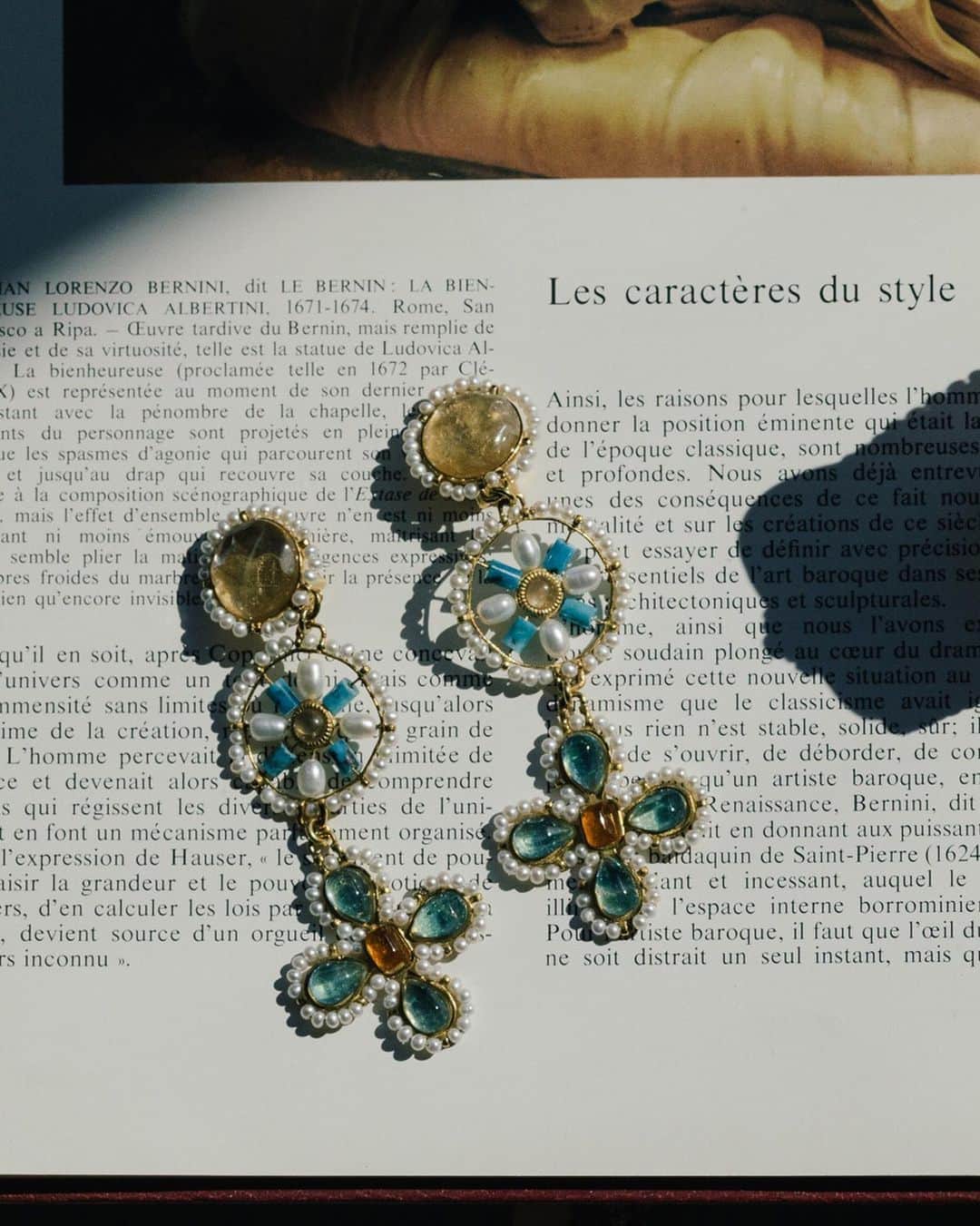 グーセンス パリのインスタグラム：「We are please to introduce our VENISE collection which is inspired by Byzantine jewelry. Fine and delicate, it reminds us of the Venetian ornaments and refinement of the time. Earrings soaked in a 24-carat gold bath, yellow gold color, adorned with natural rock crystal cabochons and freshwater pearls. . . #📷 by @alix.marnat」