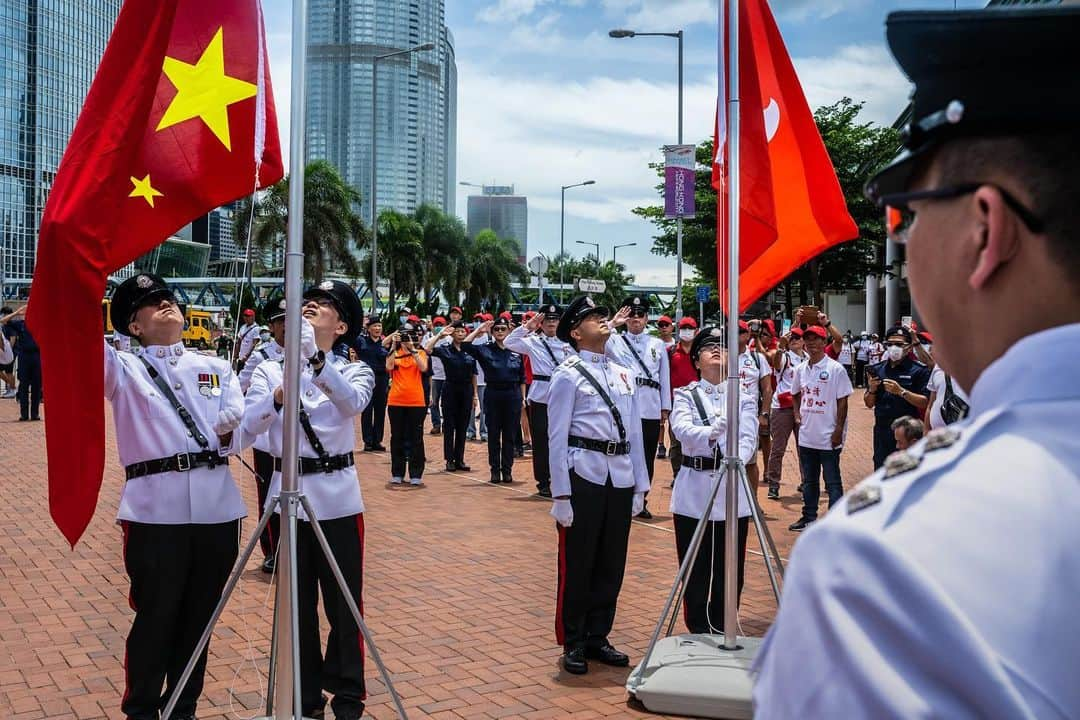 TIME Magazineさんのインスタグラム写真 - (TIME MagazineInstagram)「Beijing passed a new national security law for Hong Kong late on June 30, prompting international criticism and fear among pro-democracy figures in the former British colony. The legislation grants Beijing broad new powers to quell the protest movement that engulfed the city last year and morphed into an open challenge against the Chinese government. Enacted on the eve of the politically sensitive anniversary of Hong Kong's handover from the United Kingdom to China 23 years ago, the law prohibits acts of secession, subversion, terrorism and collusion with foreign forces. "It is a lot more severe than people expected," says Willy Lam, an expert in Chinese politics at the Chinese University of Hong Kong. In these photographs on July 1: police carry a purple sign warning about acts that violate the new law, as protesters march in the Causeway Bay neighborhood; a Chinese flag is displayed during a rally to celebrate the anniversary of the handover as well as the new law; and police detain people on a bus after clearing protesters at a rally against the new law. Read more at the link in bio. Photographs by @lamyikfei—@nytimes/@reduxpictures, @billyhckwok—@gettyimages and @daledelarey—@afpphoto/@gettyimages」7月2日 4時46分 - time