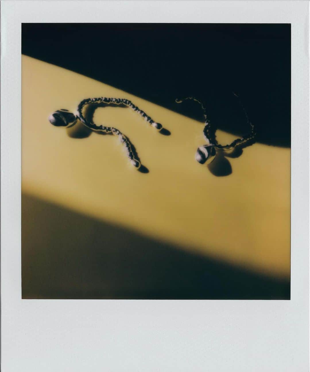 Monica Sordoさんのインスタグラム写真 - (Monica SordoInstagram)「Polaroid // The Nautilus EarFans as seen by Stylist + Visual Artist @ralguerrero during his confinement in NYC #MonicaSordo  • • Raul: “It was really about finding ways to work in my quarantine space, utilizing surfaces throughout, acknowledging the natural light of the mornings, using light as a styling element, shooting the jewelry as objects; reinforcing the prehispanic iconography of your jewelry”」7月3日 1時11分 - monicasordo