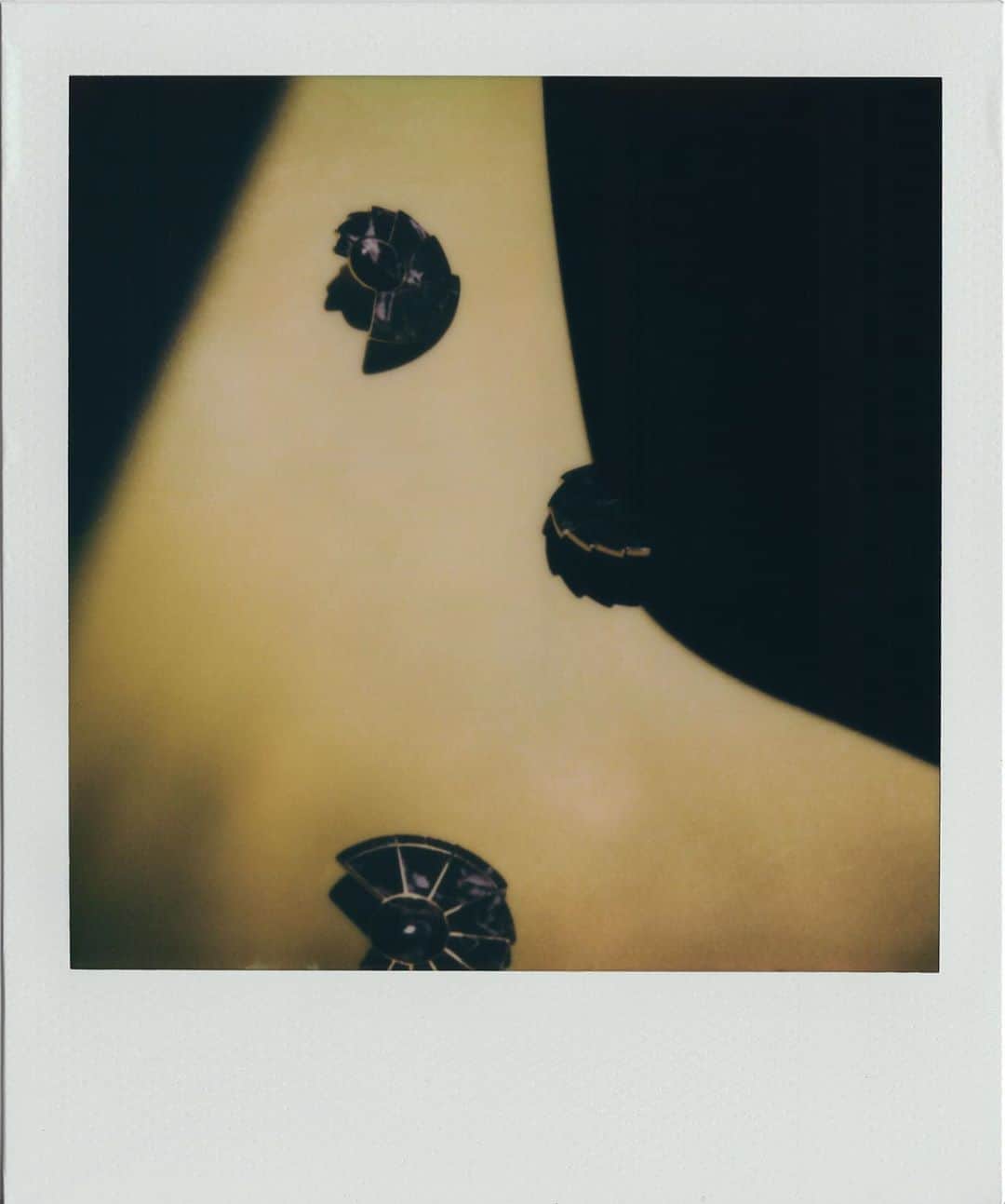 Monica Sordoのインスタグラム：「Polaroid // The Nautilus EarFans as seen by Stylist + Visual Artist @ralguerrero during his confinement in NYC #MonicaSordo  • • Raul: “It was really about finding ways to work in my quarantine space, utilizing surfaces throughout, acknowledging the natural light of the mornings, using light as a styling element, shooting the jewelry as objects; reinforcing the prehispanic iconography of your jewelry”」