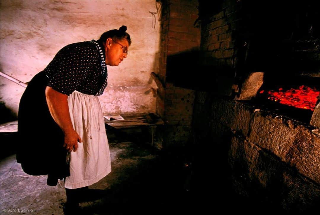 thephotosocietyさんのインスタグラム写真 - (thephotosocietyInstagram)「Photo by @gerdludwig  A villager peers into the fiery mouth of the communal bake oven in Röllshausen, Germany. The woman’s traditional costume is still worn by a handful of elderly villagers in everyday life. Reminiscent of the tale of Hänsel and Gretel, when published years ago in @natgeo, the photograph was accompanied by this quote: “Oh, you dear children, who has brought you here? Do come in, and stay with me. No harm shall happen to you. She took them both by the hand, and led them to her little house. Then good food was set before them, milk and pancakes, with sugar.”     In the early 1800s, brothers Jacob and Wilhelm Grimm published a book of fairy tales that remains unrivaled to this day. It contains such indelible, but sometimes-questionable tales as Sleeping Beauty, Little Red Riding Hood, Snow White and Cinderella. They are read today in more than 160 languages.     The two brothers, did not make up the tales themselves, however, but gathered them from a variety of storytellers across central Germany. Growing up in the region, in the town of Alsfeld, villagers would sometimes visit the town for doctors’ appointments and other errands, wearing these traditional costumes.     @alsfeld_erleben  #GrimmBrothers #fairytales #Germany #Alsfeld #GrimmsFairyTales」7月3日 2時14分 - thephotosociety