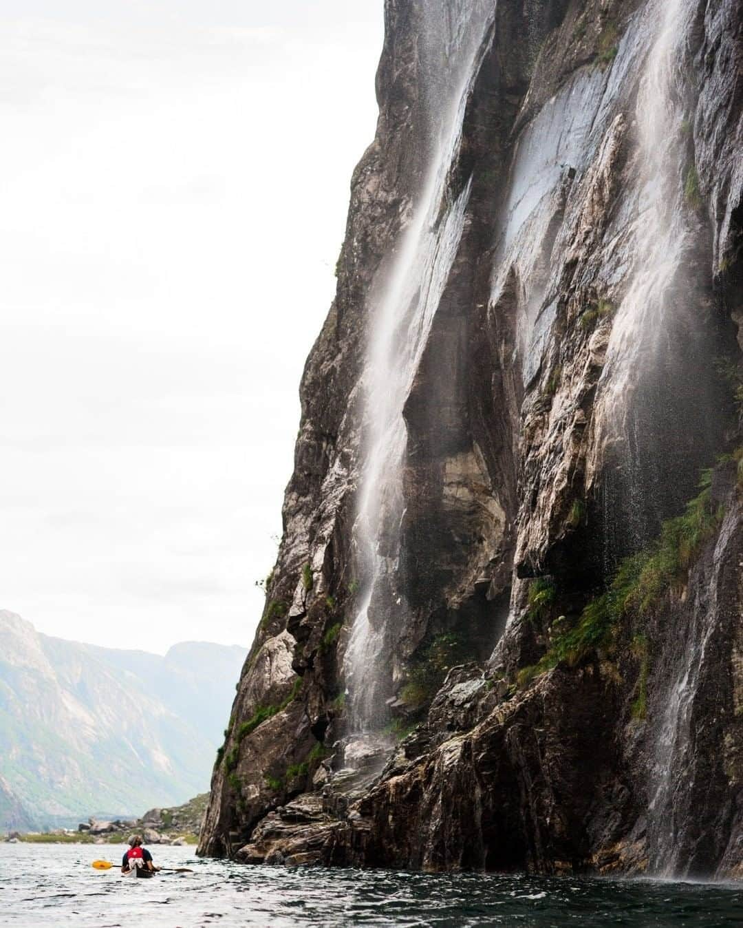 National Geographic Travelさんのインスタグラム写真 - (National Geographic TravelInstagram)「Photo by @MartinEdstrom  Kayaking is a great way to get a new perspective on a place you have seen before. While you might have seen a canyon or fjord from the top a hundred times, the experience shifts completely once you sit inches above the water and paddle your way through. This was shot in the famous Lysefjord, a place you can easily kayak during a weekend trip in southern Norway—skipping the crowds on the cliffs above.  Follow @MartinEdstrom for more adventures in the Nordics. #Norway #waterfall #exploringhome #scandinavia」7月3日 5時05分 - natgeotravel