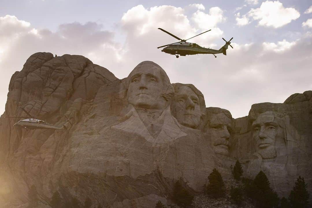 TIME Magazineさんのインスタグラム写真 - (TIME MagazineInstagram)「In divisive remarks before a big, mostly maskless crowd at the Mount Rushmore National Memorial in South Dakota on July 3, President Trump accused protesters demanding racial justice of a "merciless campaign to wipe out our history," the Associated Press reports. "The president offered a discordant tone to an electorate battered by a pandemic and seared by the recent high-profile killings of Black people. He zeroed in on the desecration by some demonstrators of monuments and statues across the country that honor those who have benefited from slavery, including some past presidents." In these photographs: Marine One, carrying Trump, flies past Mount Rushmore; an attendee dressed as President Abraham Lincoln; activists and members of different tribes from the region block the road to Mount Rushmore during a protest against the monument; the President and First Lady Melania Trump arrive onstage; Trump is projected onscreen during his remarks; and the President looks up at fireworks. Read more at the link in bio. Photographs by @al_drago—Bloomberg/@gettyimages, @andrewcr1—@afpphoto/@gettyimages, @saulloeb—@afpphoto/@gettyimages and @tom_brenner—@reuters」7月5日 6時55分 - time