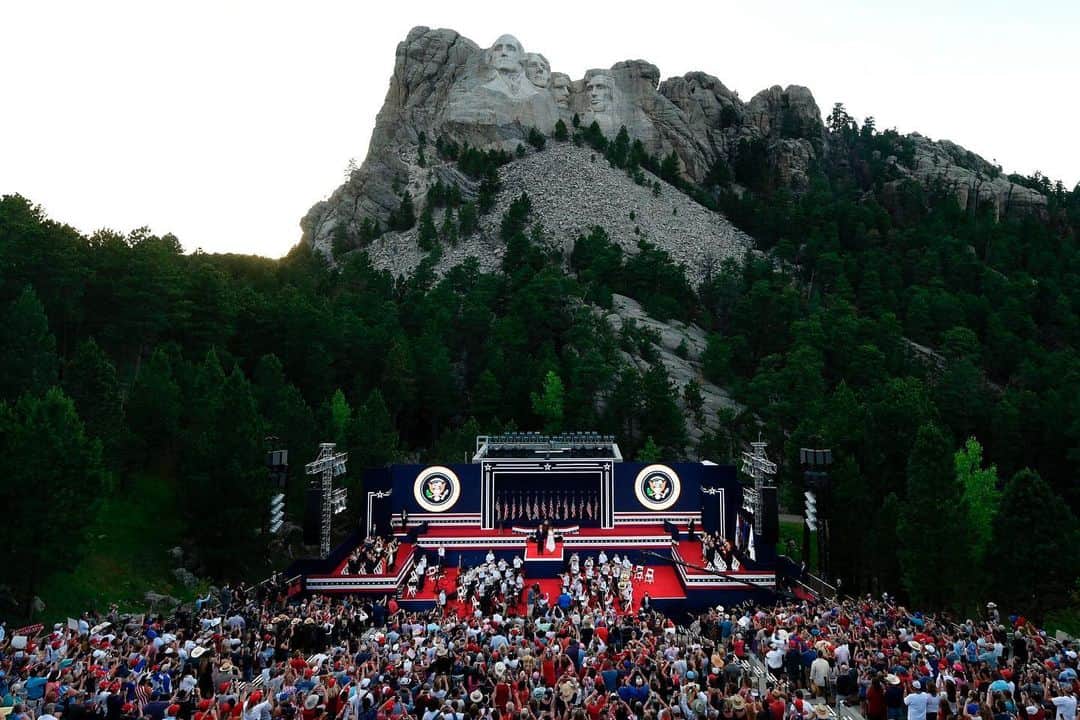 TIME Magazineさんのインスタグラム写真 - (TIME MagazineInstagram)「In divisive remarks before a big, mostly maskless crowd at the Mount Rushmore National Memorial in South Dakota on July 3, President Trump accused protesters demanding racial justice of a "merciless campaign to wipe out our history," the Associated Press reports. "The president offered a discordant tone to an electorate battered by a pandemic and seared by the recent high-profile killings of Black people. He zeroed in on the desecration by some demonstrators of monuments and statues across the country that honor those who have benefited from slavery, including some past presidents." In these photographs: Marine One, carrying Trump, flies past Mount Rushmore; an attendee dressed as President Abraham Lincoln; activists and members of different tribes from the region block the road to Mount Rushmore during a protest against the monument; the President and First Lady Melania Trump arrive onstage; Trump is projected onscreen during his remarks; and the President looks up at fireworks. Read more at the link in bio. Photographs by @al_drago—Bloomberg/@gettyimages, @andrewcr1—@afpphoto/@gettyimages, @saulloeb—@afpphoto/@gettyimages and @tom_brenner—@reuters」7月5日 6時55分 - time