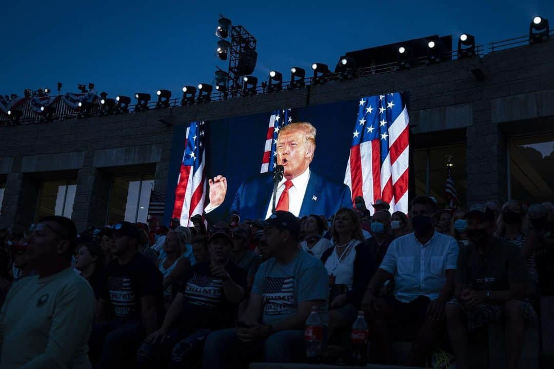 TIME Magazineさんのインスタグラム写真 - (TIME MagazineInstagram)「In divisive remarks before a big, mostly maskless crowd at the Mount Rushmore National Memorial in South Dakota on July 3, President Trump accused protesters demanding racial justice of a "merciless campaign to wipe out our history," the Associated Press reports. "The president offered a discordant tone to an electorate battered by a pandemic and seared by the recent high-profile killings of Black people. He zeroed in on the desecration by some demonstrators of monuments and statues across the country that honor those who have benefited from slavery, including some past presidents." In these photographs: Marine One, carrying Trump, flies past Mount Rushmore; an attendee dressed as President Abraham Lincoln; activists and members of different tribes from the region block the road to Mount Rushmore during a protest against the monument; the President and First Lady Melania Trump arrive onstage; Trump is projected onscreen during his remarks; and the President looks up at fireworks. Read more at the link in bio. Photographs by @al_drago—Bloomberg/@gettyimages, @andrewcr1—@afpphoto/@gettyimages, @saulloeb—@afpphoto/@gettyimages and @tom_brenner—@reuters」7月5日 6時55分 - time