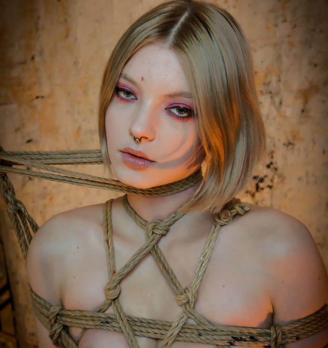 ティール・ココのインスタグラム：「Tie me up... but NEVER tie me down! 😈😇 It's been over 5 years since I've released any new accessories. During this time I've faced many struggles to be able to produce the *NEW* 15 piece collection I'll be launching this week on @tealecocothelabel 🙏 my life motto has always been "slow and steady wins the race". I take my time in my work because I'm a Perfectionist. I don't believe in creating trend fashion, I want to create pieces that can last a life time. Inspired by BDSM, the soft+tight hold of my designs, is like being held in rope!! (or our customers say is like a nice hug!!❤️) I'm so excited to be able to release this collection 🥰 sign up to email updates to be the first to know when I launch on 🌐WWW.TEALECOCO.COM🌐 And follow @tealecocothelabel for more 💥 . . . Photo+Rope: @123avalon 📸」