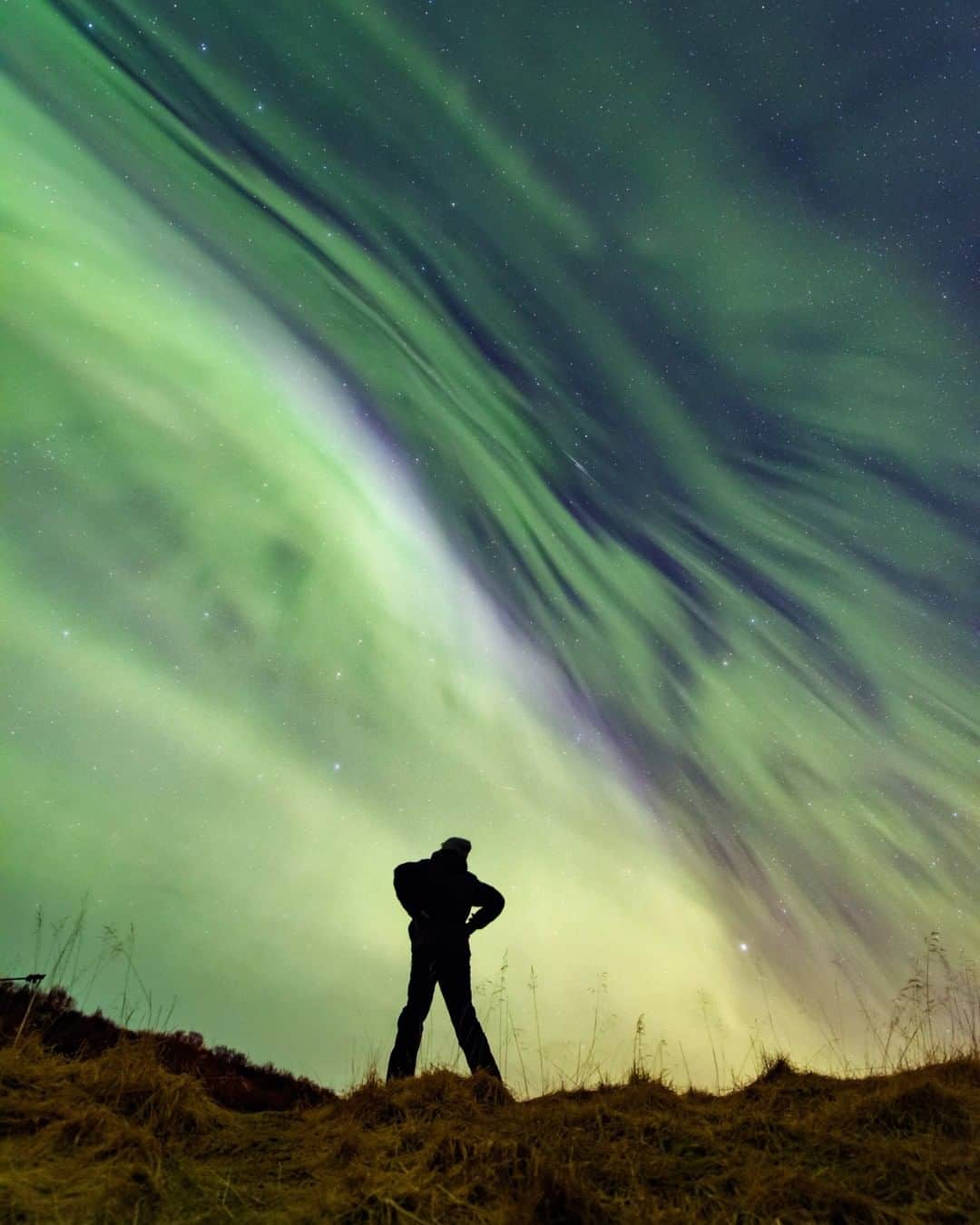 National Geographic Travelさんのインスタグラム写真 - (National Geographic TravelInstagram)「Photo by @babaktafreshi  The northern lights fill the entire sky in Iceland in March 2016. In a polar latitude after a storm-level aurora activity, the sky usually becomes like this (with less vibrant colors visible to the naked eye). Rapidly pulsating faint aurora patterns are also a part of this display. I usually visit Iceland twice a year for my aurora photo workshops, but due to the pandemic I have missed being under polar skies.  Explore more @babaktafreshi. #auroraborealis #northernlights #iceland #nightphotography」7月6日 13時10分 - natgeotravel