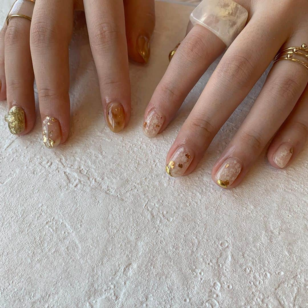 sapporo nail 【 Aster 】さんのインスタグラム写真 - (sapporo nail 【 Aster 】Instagram)「【 seina kato 】﻿ ﻿ お客様のringにあわせて﻿ designしました𓂃﻿ 夏っぽく涼しげな﻿ Orange ×  gold の組み合わせがかわいいです🍊﻿ ﻿ ＿＿＿＿＿＿＿＿＿＿＿＿＿＿＿＿＿＿＿＿﻿ ﻿ atelier Libertéは スタッフ全員が﻿ サロンの1席を借りてそれぞれが﻿ オーナーとして営業している﻿ 新しいstyleのネイルサロンです。﻿ ﻿ そのため使用素材や得意とするアートのタッチは﻿ スタッフにより異なります𓂃 𓈒✍︎﻿ ご予約の際は各スタッフのアカウントを﻿ CHECKして気に入ったデザインがあれば﻿ ご指名でのご予約をおススメ致します𓍯﻿ ﻿ ﻿ ﻿ seina→@atelier_liberte_nail (指名料¥500)﻿ yukari→@atelier_liberte_yukari (指名料¥0)﻿ yukina→@atelier_liberte_yukina (指名料¥0)﻿ akari→@﻿ ﻿ ﻿ ﻿ 各スタッフアカウントもご覧ください𓂃 𓈒✍︎﻿ やりたいアートやつけたいパーツがある場合は﻿ ご指名でのご予約がオススメです𓂅﻿ ﻿ ﻿ ﻿ ﻿ ﻿ ﻿ 𓂃𓂃𓂃𓂃𓂃𓂃𓂃𓂃𓂃𓂃𓂃𓂃𓂃𓂃𓂃𓂃𓂃𓂃𓂃﻿ ﻿ ⚠️ ご予約のお時間には必ず到着しておりますよう、よろしくお願い致します。遅れてしまいますとその後のご予約状況によっては施術をお断りさせて頂く場合もございますので、遅れそうな場合は必ずお電話にてお問い合わせください。080-4500-8832﻿ ﻿ ⚠️先日キャンセルはお席代として1500円/当日キャンセルはお席代として2,000円、次回ご来店時にご請求させていただきますので予めご了承くださいませ。﻿ ﻿ 𓂃𓂃𓂃𓂃𓂃𓂃𓂃𓂃𓂃𓂃𓂃𓂃𓂃𓂃𓂃𓂃𓂃𓂃𓂃﻿ ﻿ 当店ではジェルネイルをする過程で、﻿ 一番自爪に負担をかける【アセトンでの除去】を﻿ フィルイン（ベースの一層残し）で施術しております﻿ 正しいフィルインで健康な自爪へ✴︎﻿ 丁寧な甘皮ケアとフォルム形成でお爪を綺麗に魅せます✔︎﻿ ﻿ ﻿ ﻿ . ＿＿＿＿＿＿＿＿＿＿＿＿＿＿＿＿﻿ ﻿ ﻿ ﻿ 《𝐚𝐭𝐞𝐥𝐢𝐞𝐫 𝐋𝐢𝐛𝐞𝐫𝐭𝐞店舗情報》﻿ ﻿ place: 札幌市中央区南1条西8丁目9  BB1・8ビル5階﻿ ﻿ TEL :  080-4500-8832﻿ ﻿ open 10:00 close 22:00﻿ ﻿ ﻿ ﻿ 《ご予約方法》﻿ ﻿ ✺ご予約専用LINE➠@zzr4693w﻿ お名前フルネーム(カタカナ)﻿ お電話番号﻿ ご希望のお日にち(第3希望まで)﻿ ご希望コース オフの有無﻿ ﻿ 上記を記載の上ご連絡下さい✍︎。﻿ ﻿ ﻿ ✺当日のご予約・お問い合わせ➠﻿ お電話にてお問い合わせ下さい⚠︎﻿ ☎︎080-4500-8832﻿ ﻿ ﻿ ＿＿＿＿＿＿＿＿＿＿＿＿＿＿＿＿＿＿﻿ ﻿ #札幌ネイルサロン#ネイルデザイン #札幌ネイリスト #札幌 #札幌ネイル #フィルイン #nail #シンプルネイル #クリアネイル #札幌フィルイン#淡色女子#ドライフラワーのある暮らし #水彩ネイル#札幌ニュアンスネイル #カメラ女子#ネイル#春コーデ #春ネイル #札幌フィルインサロン #スプリングネイル #ミントグリーン #ミントグリーンネイル #天然石ネイル #オーロラネイル #クリアネイル #ショートネイル #天然石ネイル #ミラーネイル ﻿ ﻿」7月6日 13時19分 - seina.kato___