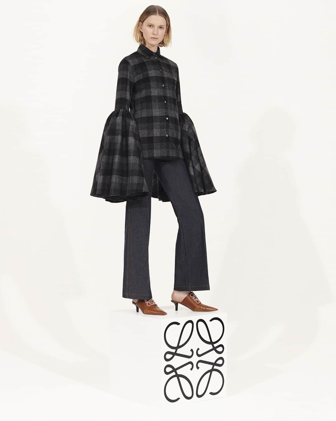 のインスタグラム：「The LOEWE Fall Winter 2020 pre-collection is now available in store and on loewe.com  Doll-like day dresses, blouses and wide-legged trousers fan out in pleats, while coats are precisely tailored.  #LOEWE #LOEWEFW20」