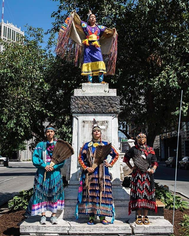 Vogueさんのインスタグラム写真 - (VogueInstagram)「This Fourth of July weekend, a group of Indigenous women in Detroit reclaimed space on a monument where Columbus once stood. The group of dancers who took over his post, in their traditional regalia no less, served as a powerful statement—one that highlighted the resiliency of Indigenous women. “There’s a saying that goes, ‘You are an answer to your ancestors’ prayers,” GreenSky, pictured above, middle, says. “When I was around that monument, I felt like I could feel the entire timeline of trauma that this land has felt. We didn’t fight Christopher Columbus, but we definitely fought the spirits that were there.” Tap the link in our bio to read the full story.」7月7日 9時26分 - voguemagazine