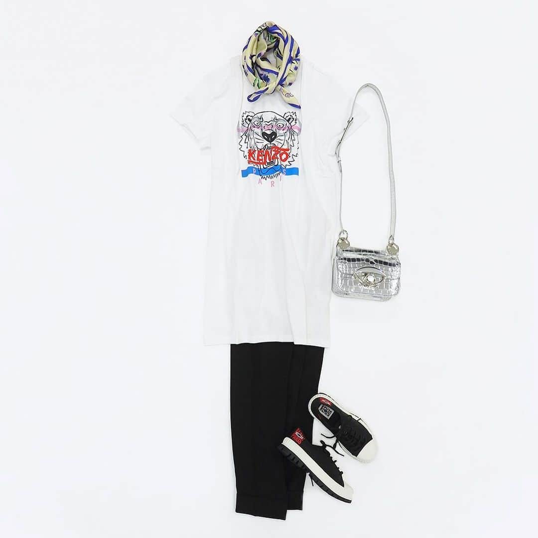 のインスタグラム：「パーソナルスタイリストが提案する最旬コーディネートをお届けするSTYLE NOTE💁🏻‍♀️💕﻿ ﻿ 【KENZO PICK-UP】﻿ プラスαのアイテムでTシャツスタイルをアップデート！﻿ ﻿ 夏に大活躍するアイテムといえば「Tシャツ」。﻿ ﻿ シンプルなTシャツもロング丈にすることで雰囲気が一変。﻿ 身幅は広すぎず、すっきりとしたシルエットですので、女性らしい印象でお召しいただけます。﻿ ﻿ Sea Lily＝海岸地帯に生息する野生の植物・花　をモチーフにしたスカーフをアクセントに。﻿ ﻿ 夏はついTシャツ×デニムになりがち。なんて方も、ぜひこの夏はTシャツの長さやシルエットを変えていただいたり、プラスαのアイテムでおしゃれを楽しんでみてはいかがでしょか。﻿ ﻿ STYLE NOTEでは着用動画🎥やスタイリングのクローズアップ写真📸をご覧いただけます。﻿ @stripedepartment プロフィールURLよりチェックしてみてください。﻿ ﻿ #ストデパwomen﻿ #ストデパ #ストライプデパートメント　#stripedepartment﻿ #stylenote #womensstyling #summerfashion2020 #Summer20 #スタイルノート #夏服  #夏服コーデ #大人コーデ #大人シンプル #シンプルコーデ #キレイめコーデ #きれいめカジュアル #カジュアルスタイル #大人カジュアルコーデ #夏コーデ #最旬スタイル #置き画くら部 #置き画倶楽部 #kenzo #ケンゾー #tシャツ #tシャツワンピース #ワンピース #tシャツコーデ #kenzoタイガープリント #スニーカーコーデ﻿」