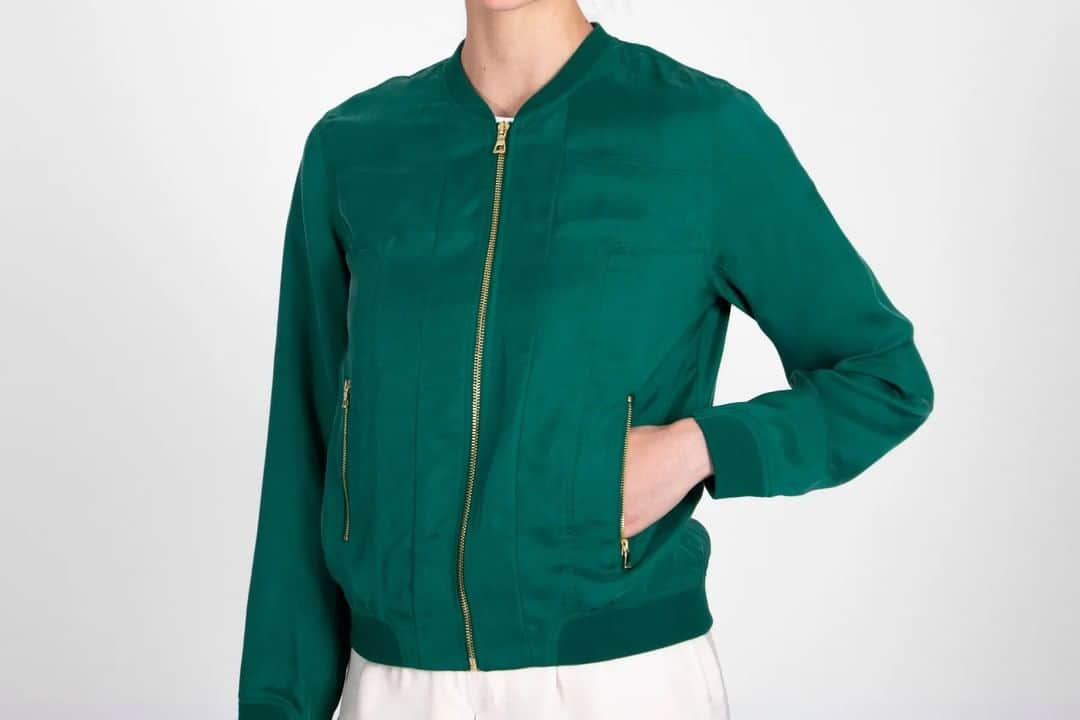 アクアスキュータムのインスタグラム：「Crafted from Italian cupro fabric in rich emerald green, this #Aquascutum blouson has an almost satin appearance – making it the perfect attire for post lockdown cocktails. Sienna features seam detailing & a curved contrast rib texture at the collar & hem.」