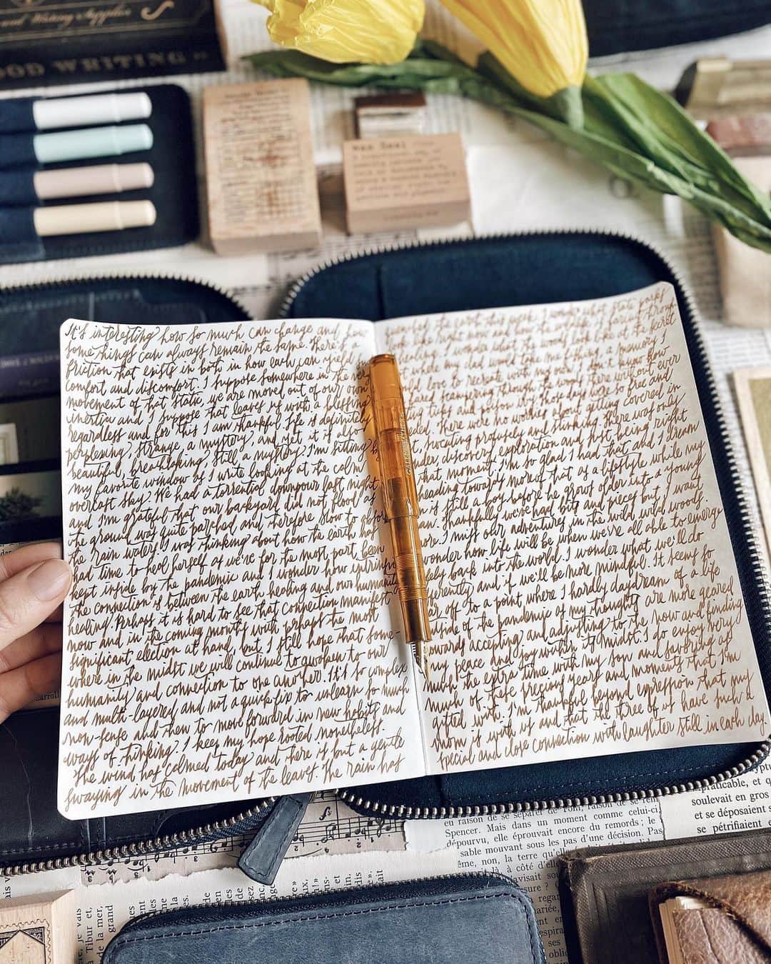 Catharine Mi-Sookさんのインスタグラム写真 - (Catharine Mi-SookInstagram)「Journals are sacred keepers of the stories we choose and wish to share. Perhaps that’s why I find this practice so peaceful and fulfilling. There is no pushing or prodding of nosiness, no interruptions, no unsolicited advice, no hidden agendas, no limitations. It is one of the safe spaces where the heart can stretch out freely and somewhere in the exchange of it all beauty is created in inked words splayed throughout pages. There is such a magic, a healing, a wondrous world stowed within a journal and I love it so. . . . . Featuring the @galen_leather B6 Everyday Notebook in Forest Green Leather with Tomoe River Paper, A5 Navy Padfolio & Scrikss Fountain Pens. Penned with the new release of @kaweco.germany collaboration with @galen_leather in the Cognac Sport Fountain Pen. . . . . #journaling #dailyjournal #galenleather #tomoeriverpaper #leatherjournal #leatherjournals #loveforanalogue #kaweco #kawecosport #foutainpens #fountainpenaddict #penmanship #flatlaystyle #flatlayphotography #flatlays #thingsorganizedneatly #stationeryaddict #stationerylove #plannercommunity #journallove #journalinspiration #thedailywriting #onmydesk #journalcommunity」7月8日 1時59分 - catharinemisook