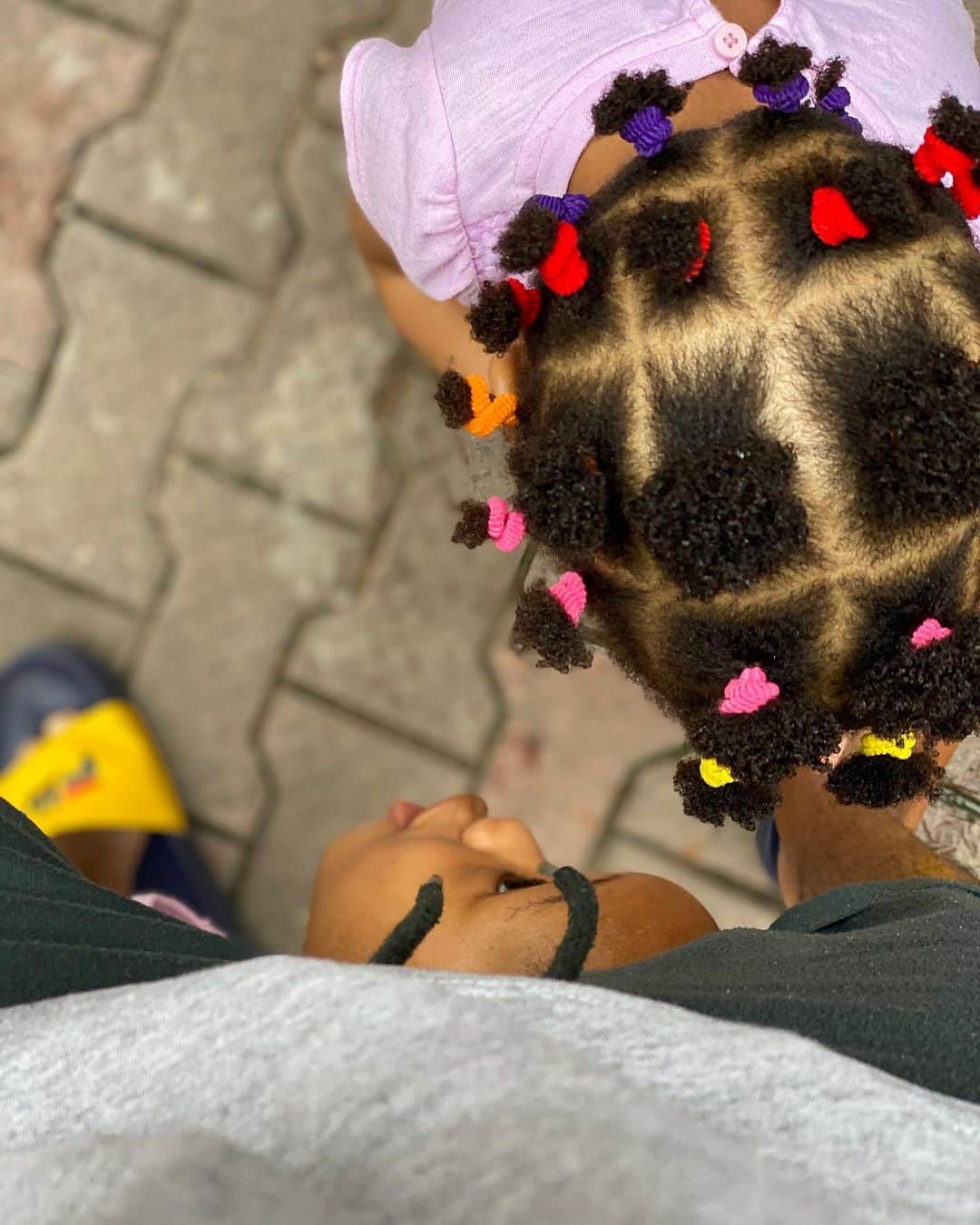 ノーブル・イグウェさんのインスタグラム写真 - (ノーブル・イグウェInstagram)「Guitar Girl  We have a new Guitarist in the house and she goes by the name Jax. But before that, these girls are still not all still feeding their fish,maybe we need to get a second fish for Becks. Do fishes get lonely ? About Guitar,I didn’t know she had any sort of interest in Guitars until we drove out yesterday. Jax : Daddy, I want to pink Guitar Nobs : Oh really  Jax : Yes, Daddy  Nobs : Let me think about that  Jax : Don’t think about it  Nobs : But I have to  Jax : Why Daddy ?  Nobs : Because I have to check if I can afford it first and then plan towards that. Jax : Okay Daddy. I want pie too  Nobs : You want a Guitar and a pie ?  Jax : Yes Daddy  Nobs : Hmmmm Jax : Thank You,Daddy  Nobs : You are trying to trick me into buying them  Jax : Maybe Daddy  I think this girl thinks that I’d get her anything she ask for and that’s almost true, as long as we can afford it and it’s reasonable, we’d buy it for them. While driving, something funny happened, we saw a stop sign, the driver slowed down but didn’t stop  Jax : Daddy,Mr Shedrack didn’t stop  Nobs : Why love  Jax : It says “ Stop”  Nobs : What love  Jax : It says stop * Pointing at the stop sign* Nobs : Oh wow . You can read that ?  Jax : Yes Daddy  I was taken aback and it dawned on me that we should increase the number of things she reads. I know she must have noticed the stop sign from one of her TV shows but it was also a sign for me to expose her more to such shows. On Lia. She can now count from 1-10, something Jax couldn’t do at her age but I guess watching Jax study has helped her. Lia is outgrowing some of her toys, we had to get Jax a new bicycle and give her old one to Lia. They have turned the living room into a mini park with Jax shouting  Jax : I’m stuck,Daddy  Nobs : Get down and turn it around  Jax : Okay,Daddy  Nobs : Good girl  Jax : Daddy, my bell won't ding-ding  Nobs : I’ll look into that later  Jax : Now, not later,Daddy  Nobs : I’m trying to watch TV  Jax : Please Daddy  Nobs : Okay love  This evening, we went out to check the plants but they decided to run around in between my legs.  What is that game called ?」7月8日 2時44分 - noble_igwe