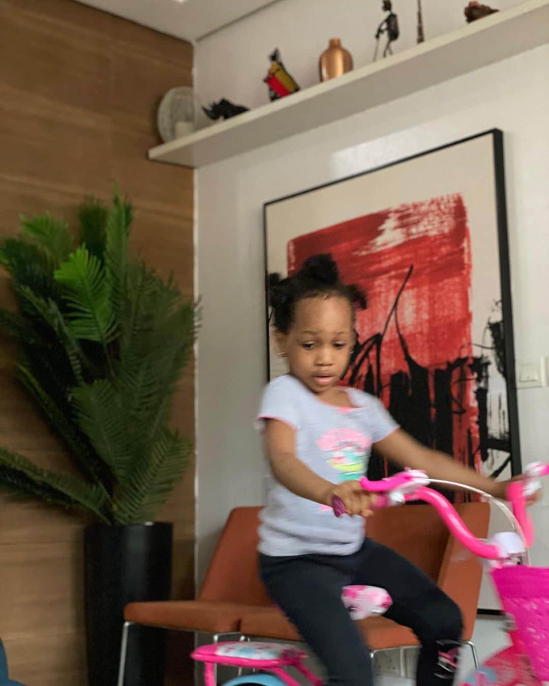 ノーブル・イグウェさんのインスタグラム写真 - (ノーブル・イグウェInstagram)「Guitar Girl  We have a new Guitarist in the house and she goes by the name Jax. But before that, these girls are still not all still feeding their fish,maybe we need to get a second fish for Becks. Do fishes get lonely ? About Guitar,I didn’t know she had any sort of interest in Guitars until we drove out yesterday. Jax : Daddy, I want to pink Guitar Nobs : Oh really  Jax : Yes, Daddy  Nobs : Let me think about that  Jax : Don’t think about it  Nobs : But I have to  Jax : Why Daddy ?  Nobs : Because I have to check if I can afford it first and then plan towards that. Jax : Okay Daddy. I want pie too  Nobs : You want a Guitar and a pie ?  Jax : Yes Daddy  Nobs : Hmmmm Jax : Thank You,Daddy  Nobs : You are trying to trick me into buying them  Jax : Maybe Daddy  I think this girl thinks that I’d get her anything she ask for and that’s almost true, as long as we can afford it and it’s reasonable, we’d buy it for them. While driving, something funny happened, we saw a stop sign, the driver slowed down but didn’t stop  Jax : Daddy,Mr Shedrack didn’t stop  Nobs : Why love  Jax : It says “ Stop”  Nobs : What love  Jax : It says stop * Pointing at the stop sign* Nobs : Oh wow . You can read that ?  Jax : Yes Daddy  I was taken aback and it dawned on me that we should increase the number of things she reads. I know she must have noticed the stop sign from one of her TV shows but it was also a sign for me to expose her more to such shows. On Lia. She can now count from 1-10, something Jax couldn’t do at her age but I guess watching Jax study has helped her. Lia is outgrowing some of her toys, we had to get Jax a new bicycle and give her old one to Lia. They have turned the living room into a mini park with Jax shouting  Jax : I’m stuck,Daddy  Nobs : Get down and turn it around  Jax : Okay,Daddy  Nobs : Good girl  Jax : Daddy, my bell won't ding-ding  Nobs : I’ll look into that later  Jax : Now, not later,Daddy  Nobs : I’m trying to watch TV  Jax : Please Daddy  Nobs : Okay love  This evening, we went out to check the plants but they decided to run around in between my legs.  What is that game called ?」7月8日 2時44分 - noble_igwe