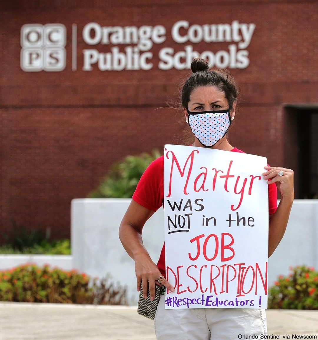 ABC Newsさんのインスタグラム写真 - (ABC NewsInstagram)「Rachel Bardes holds a sign that reads "Martyr was not in the job description" in front of the Orange County Public Schools headquarters as teachers protested. Pres. Trump has recently made calls to reopen schools amid the COVID-19 crisis. #protesting #schools #education #covid19 #coronavirus」7月9日 2時54分 - abcnews