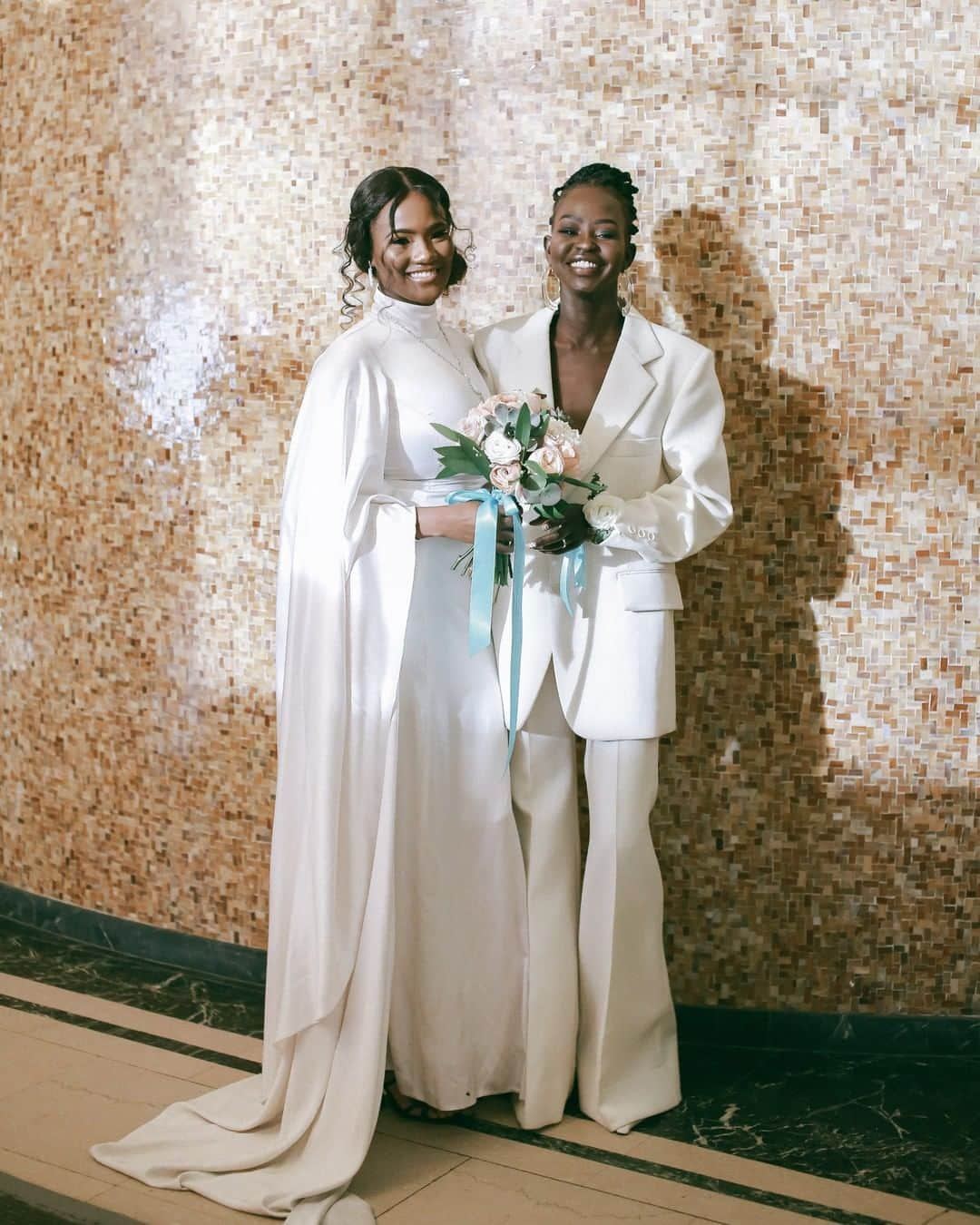 Vogueさんのインスタグラム写真 - (VogueInstagram)「Aweng Ade-Chuol (@awengchuol) and Alexus Ade-Chuol's (@lexymayjust) wedding was held at City Hall in Manhattan this past December. “I love my now wife so much that all of my childhood dreams of what a wedding should be went out the window,” Alexus says. “I just wanted to be with her and a few people that meant something to her and myself.”  “During the ceremony, I felt at peace, as if all of the flights, the tears, and sweat leading up to the ceremony was beyond worth it,” Aweng says. “I felt although we almost missed our big day, we had each other and were finally eye to eye in front of our loved ones, and nothing in the world could top that.”  Tap the link in our bio to go inside their New York City wedding, which they celebrated with tattoos and pizza. Photo by @photo_tatianakatkova」7月8日 23時30分 - voguemagazine