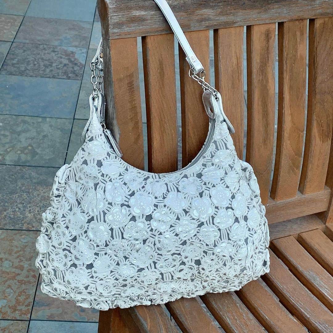 のインスタグラム：「This off-white puffed floral embossed  leather hobo with a touch of silver wash is one of the season’s hottest. Check our new day bag collection through link in bio ☝️. #ingechristoper #summerstyle」