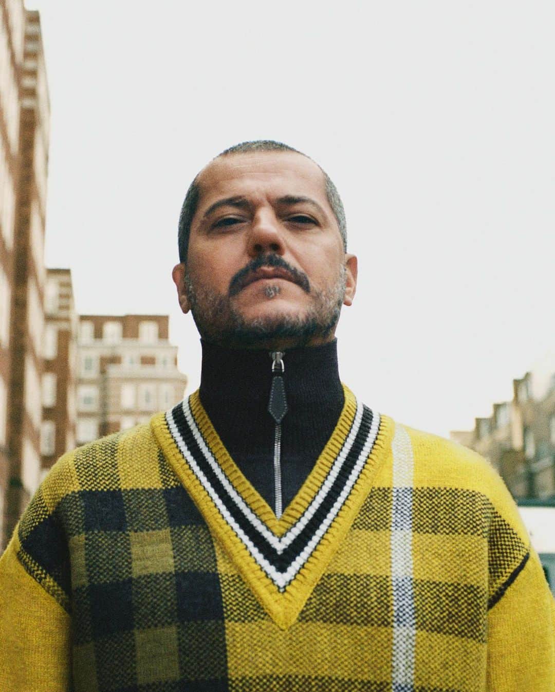 Burberryさんのインスタグラム写真 - (BurberryInstagram)「Massimo, Accessories Design, Hackney . Our Spring/Summer 2021 pre-collection lookbook – a celebration of the #Burberry community and our founder Thomas Burberry’s legacy of discovery and exploration . Massimo wears a bright yellow check cashmere wool jacquard reconstructed sweater, shorts and our runway Arthur sneakers from the upcoming collection, available in November . #BurberryPreSS21」7月23日 23時03分 - burberry