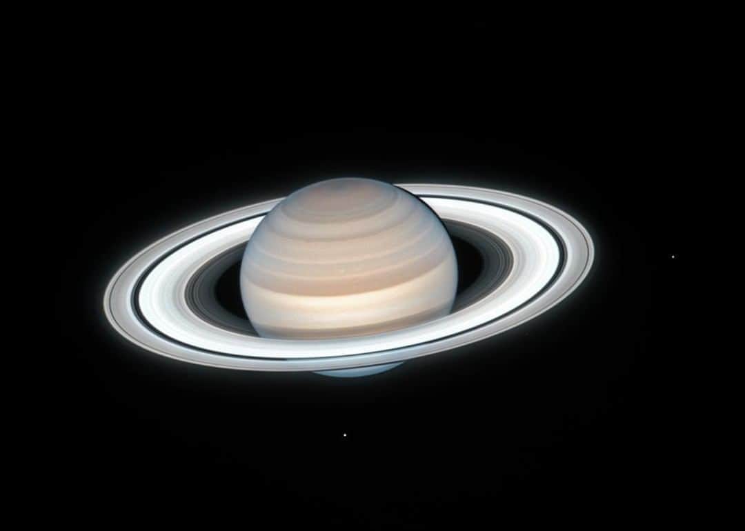 NASAさんのインスタグラム写真 - (NASAInstagram)「@NASAHubble captured this image of Saturn on July 4, 2020. Two of Saturn's icy moons are clearly visible in this exposure: Mimas at right, and Enceladus at bottom. This image is taken as part of the Outer Planets Atmospheres Legacy (OPAL) project: helping scientists understand the atmospheric dynamics and evolution of our solar system's gas giant planets. In Saturn's case, astronomers continue tracking shifting weather patterns and storms.  Credits: NASA, ESA, A. Simon (Goddard Space Flight Center), M.H. Wong (University of California, Berkeley), and the OPAL Team」7月24日 2時13分 - nasagoddard