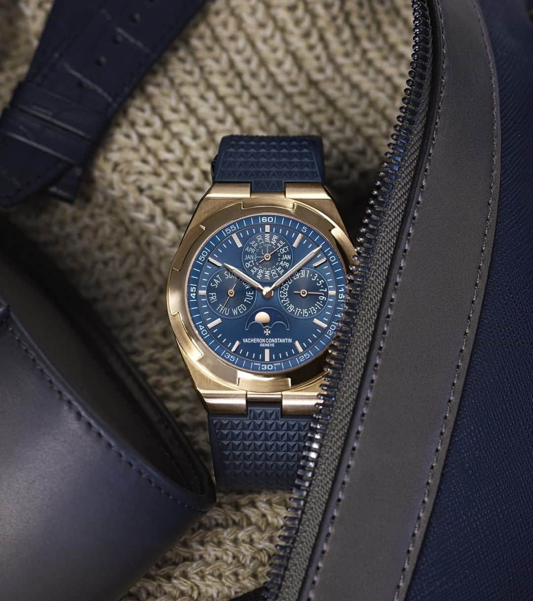 のインスタグラム：「⁣Packing for the unknown. ✈⠀ ⠀ 👜 Discover this relaxed version of the Overseas perpetual calendar ultra-thin graced with a blue dial framed by a pink gold case and blue strap.⠀ ⠀ ⠀ ⠀ ⁣We are pleased to announce that Consumer Financing options are now available at the Vacheron Constantin Boutique, 37 Old Bond Street.⠀ ⠀ ⠀ ⠀ ⁣#VacheronConstantin #OneOfNotMany #vacheron #thehourlounge #watches #watch #watchesofinstagram #horology #watchoftheday #instawatch #geneva #swissmade #swisswatch #watchesofinstagram #luxury #luxurywatch #vcoverseas #skeletonwatches #london⠀ ⠀」