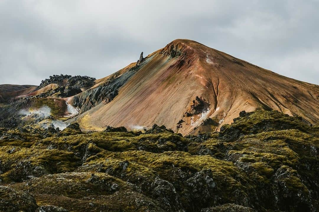 National Geographic Travelさんのインスタグラム写真 - (National Geographic TravelInstagram)「Photo by Matt Borowick @mborowick  The drive out to Landmannalaugar is a wonderful experience by itself, but when you finally reach the Brennisteinsalda campsite, you will understand fully why the rocky terrain leading up to this point was well worth the trek. Mount Brennisteinsalda is an active volcano with hot sulphur springs and vapor spewing out from the earth. It last erupted back in 1961, but it is safe to explore the area. Looking over the Laugahraun lava field toward the volcano, you can see a wonderful color change on the mountain, which is also called the Sulphur Wave.  Follow @mborowick for more pictures like this. #iceland #mountains #travel #nature #explore」7月10日 5時05分 - natgeotravel