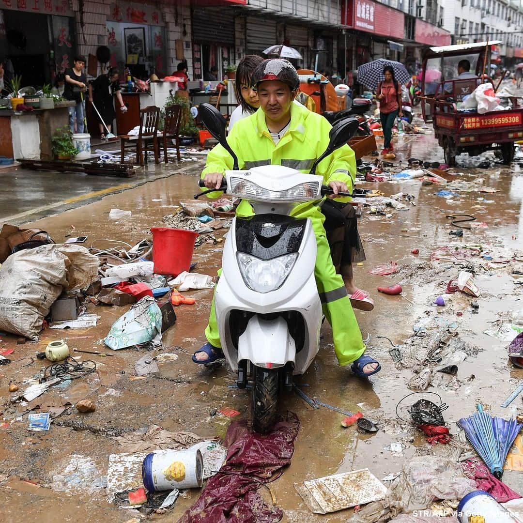 ABC Newsさんのインスタグラム写真 - (ABC NewsInstagram)「Man rides scooter through trash-filled street after heavy rains caused flooding in Shexian county, eastern China. #scooter #flood #china」7月10日 21時49分 - abcnews