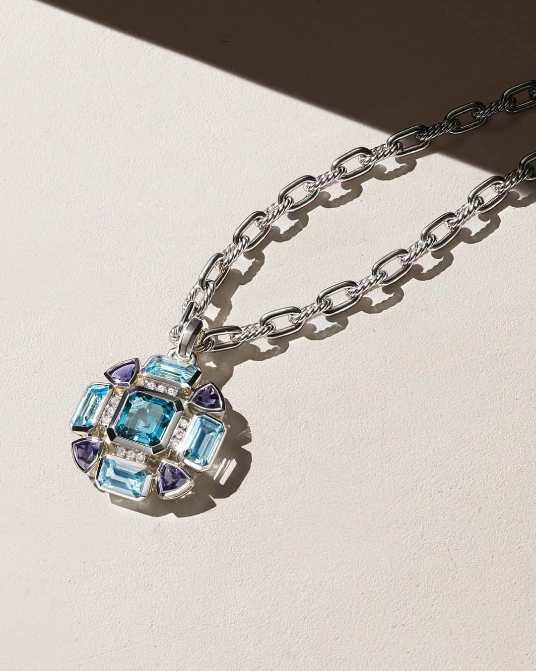デビッドヤーマンのインスタグラム：「Where the sky meets the sea. Hampton blue topaz, diamonds and iolite come together in this new Novella pendant, echoing sky blues and ocean tides. #DYRoadTrip #DavidYurman」