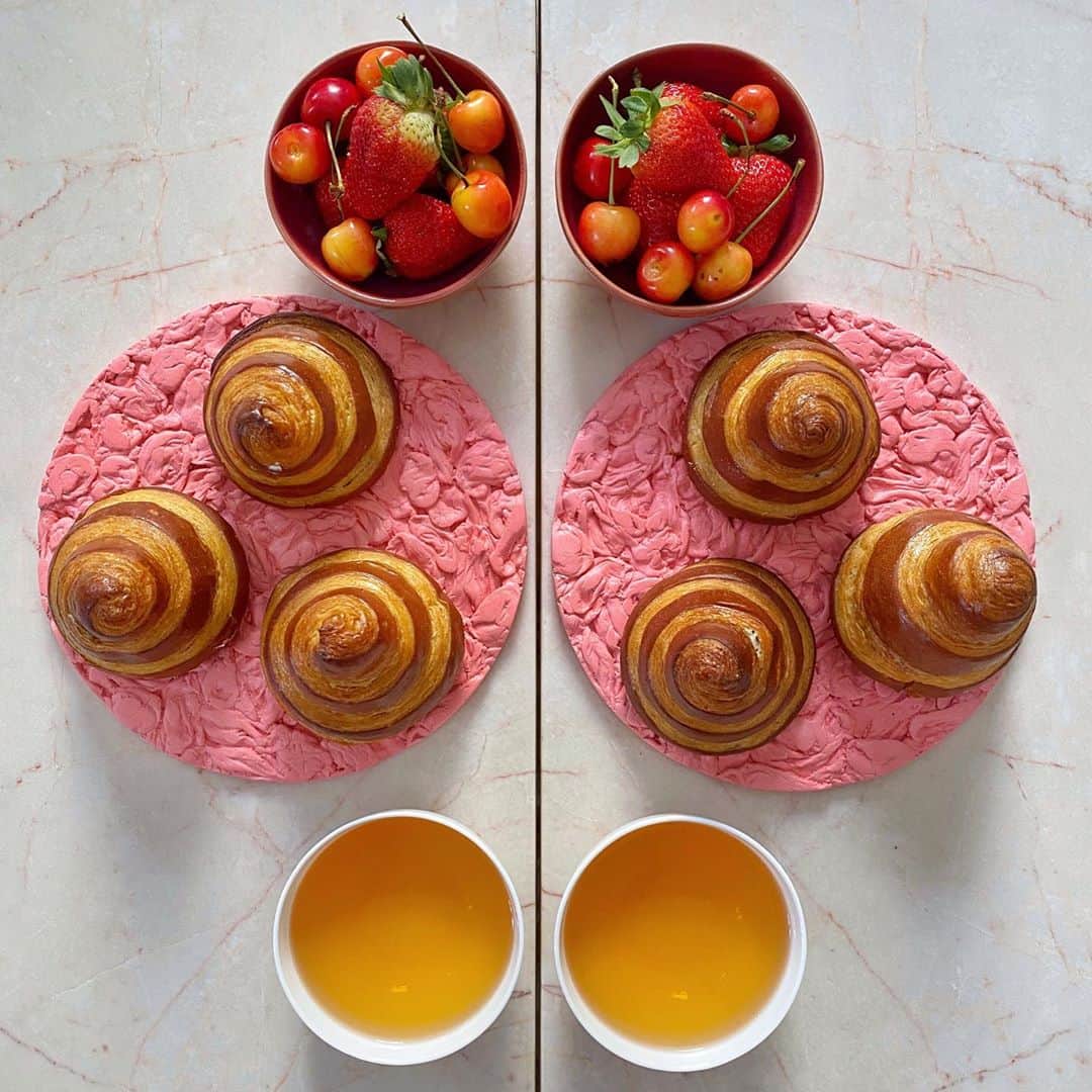 Symmetry Breakfastのインスタグラム：「#gift Sunday breakfast on our new(ish) Folio marble tables from @formar_editions cut from a single piece of pink marble, book matched for symmetry ❤️ Truffle croissant cones, filled with a truffle bechamel, they look like Madonna’s bra circa 1990, with cherries, strawberries and Cloud tea from Meghalaya 🙌🏼 #symmetrybreakfast - - - - - - - - - - - - - - - - - - The @formar_editions designs are quite unique, using already cut and often discarded blocks of marble from quarries. They’re cut using diamond wire to not only  minimise waste, but to create a table that looks as thin and delicate as a piece of draped cloth. So stunning 😍」