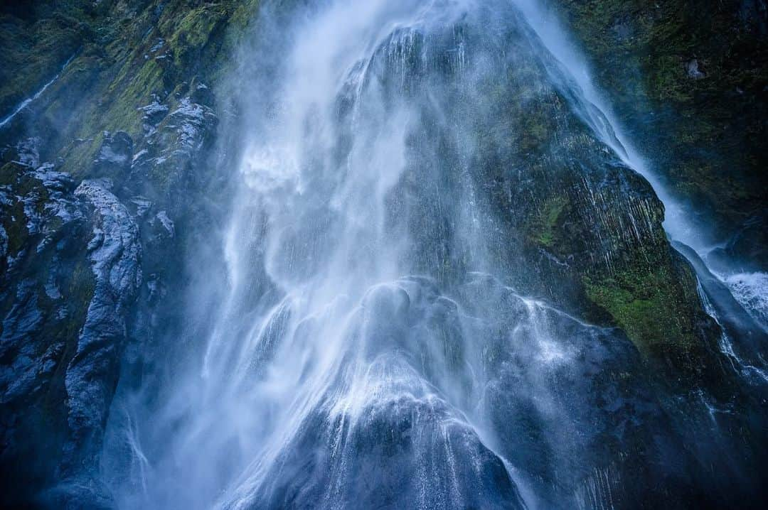 National Geographic Travelさんのインスタグラム写真 - (National Geographic TravelInstagram)「Photos by @michaelclarkphoto  Water flows over the base of giant waterfalls in the Milford Sound on the South Island of New Zealand. While touring around Milford Sound, I found the waterfalls to be one of the most interesting features photographically. When we got close to the base and let the spray wash over us, these waterfalls transformed into abstract paintings. #milfordsound #newzealand #waterfalls」7月14日 1時08分 - natgeotravel