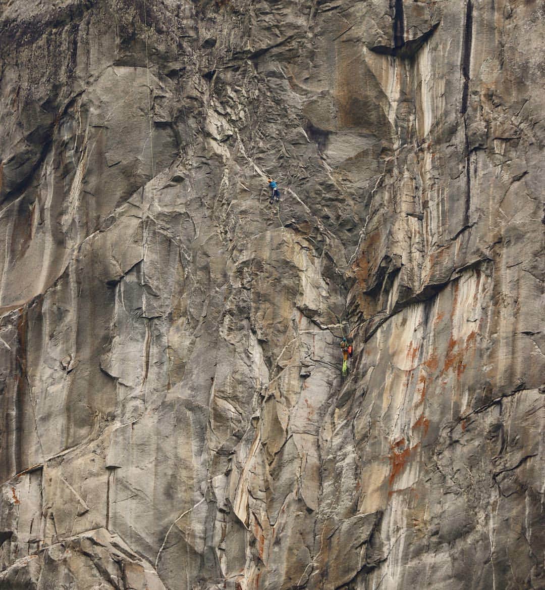 イェルネイ・クルーダーのインスタグラム：「Lost in the sea of granite. Can you spot me on my successful try on 8a pitch of "Il mito della caverna"? Story begins with not such bright situation about travelling around the world. First cancellation of my tickets to Rocklands, than not finding a normal connection to Mallorca, I finally decided for the third option- to test my self on some hard, gneiss multi pitch routes in Ticino. Partnering up with no one else  but @marcojubes was a proper decision. No hesitation first day. We were already struggling through some sketchy, not so well protected pitches, and working fast on the moves on hardest one. Few more scary pitches and we reached the top. Memorising the moves, placements and sizes of the gear before next day wasn't necessary.  We felt good and we went for an ascent. Day 2 no falling, and 300 meters of 6a, 6b+, 7a, 7b+, 7c, 8a, 5b, 6c and 6a were behind us 😁. 📸: @onlynuts  ______________ @scarpaspa @ocun.climbing @vibram @snowmonkey」