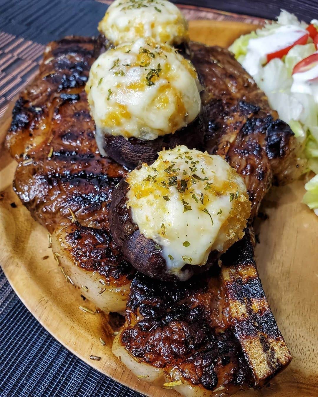 Flavorgod Seasoningsさんのインスタグラム写真 - (Flavorgod SeasoningsInstagram)「Big Ass Bone in Ribeye w/Crab Stuffed Mushrooms⁠ -⁠ Customer:👉 @ketobrawn⁠ Seasoned with:👉 #Flavorgod pink salt and peppercorn⁠ -⁠ KETO friendly flavors available here ⬇️⁠ Click link in the bio -> @flavorgod⁠ www.flavorgod.com⁠ -⁠ Saturday nights are made for good food and good vibes. The name says it all, this ribeye ( seasoned with @flavorgod steak rub and Italian Zest ) is 1.5lbs seared in a HOT cast iron for about 4 minutes a side and done⁠ The stuffed mushrooms......⁠ Preheat oven to 400°⁠ ⁠ 12 whole mushrooms⁠ 8oz lump crab meat⁠ 4oz cream cheese⁠ 1/4 cup shredded cheddar⁠ 1/4 cup mozzarella⁠ 1/4 cup parmesan⁠ 1/2 cup minced onion⁠ 1 tbsp minced garlic⁠ 2 tbsp melted butter⁠ Salt pepper to taste, we use @flavorgod pink salt and peppercorn⁠ ⁠ 1) Soften cream cheese , sautè the onion til just colored then add the garlic to bloom. Put into a med bowl. Add cream cheese and the rest of ingredients.⁠ 2) Take mushrooms stems off with your fingers and wash. Stuff with crab mixture. Brush with melted butter. Sprinkle with @porkkinggood panko. Add just a bit of oil to your oven safe dish of choice ( we used our cast iron skillet ) put the shrooms in and bake for 20 minutes.⁠ You can spinkle with mozzarella after they are done, baste with butter, whatever you like.. Happy Saturday Brawnies !!!! ❤❤❤⁠ -⁠ Flavor God Seasonings are:⁠ 💥ZERO CALORIES PER SERVING⁠ 🔥0 SUGAR PER SERVING ⁠ 💥GLUTEN FREE⁠ 🔥KETO FRIENDLY⁠ 💥PALEO FRIENDLY⁠ -⁠ #food #foodie #flavorgod #seasonings #glutenfree #mealprep #seasonings #breakfast #lunch #dinner #yummy #delicious #foodporn」7月14日 10時01分 - flavorgod