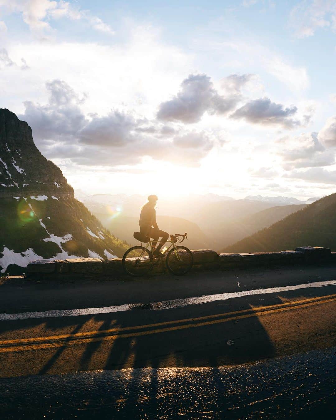 Alex Strohlさんのインスタグラム写真 - (Alex StrohlInstagram)「A glorious moment biking down in Glacier Park. For the photo curious—This first image is a composite of 60 RAW’s shot on a 35mm lens. I assembled it in Lightroom, did a sneaky edit, then corrected the perspective of the road on Photoshop.   #2 is a crop at 100% to give you some perspective of how large the file ends up being(!)  #3 is a video of all 60 stills in the order they were shot.   Love packing light and keeping it simple with 1 camera and 1 lens that can do everything.」7月15日 0時08分 - alexstrohl