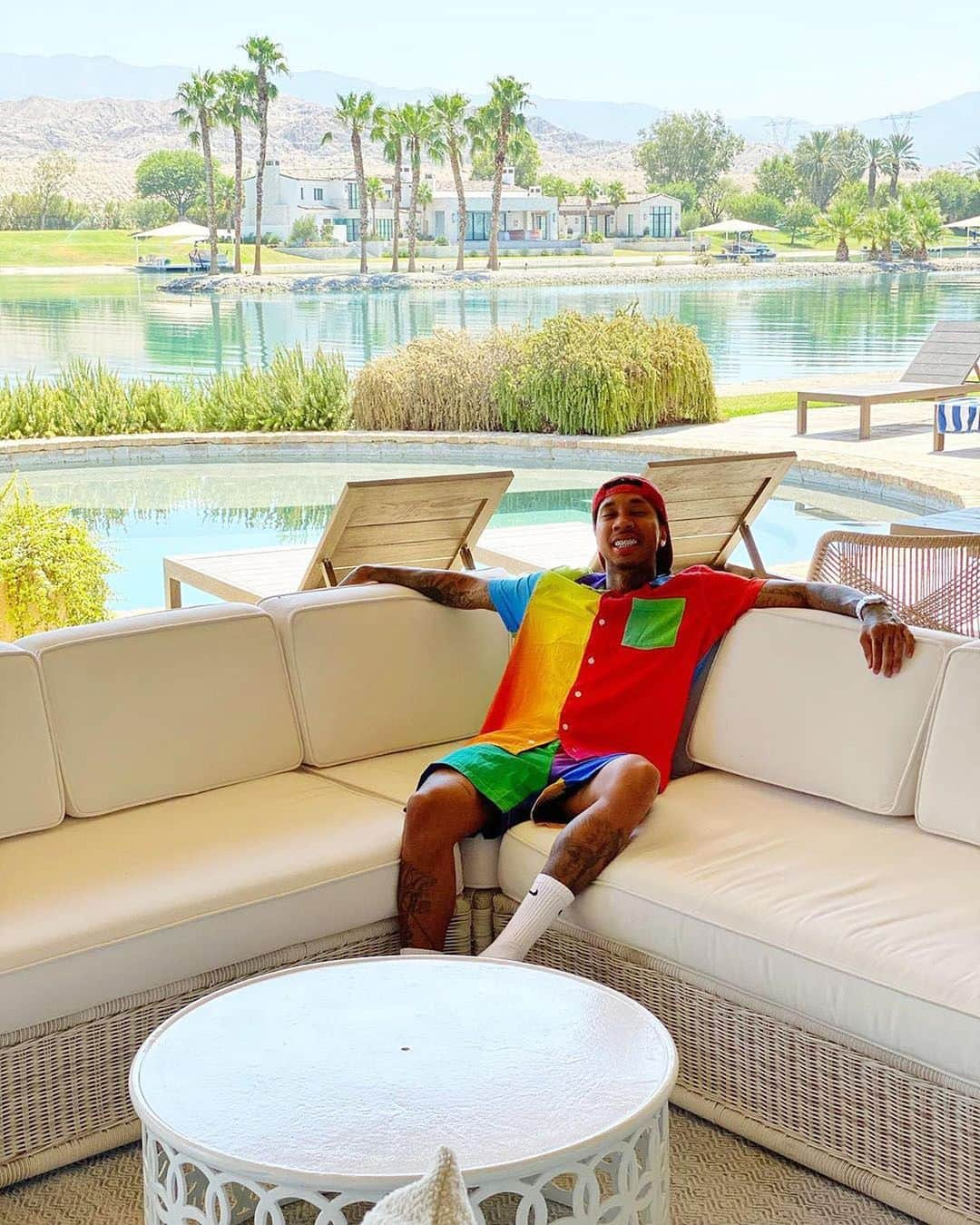 ゲスさんのインスタグラム写真 - (ゲスInstagram)「a taste of the good life 🌴 @tyga in the #GuessxJBalvin Prism Shirt + Shorts」7月15日 1時03分 - guess