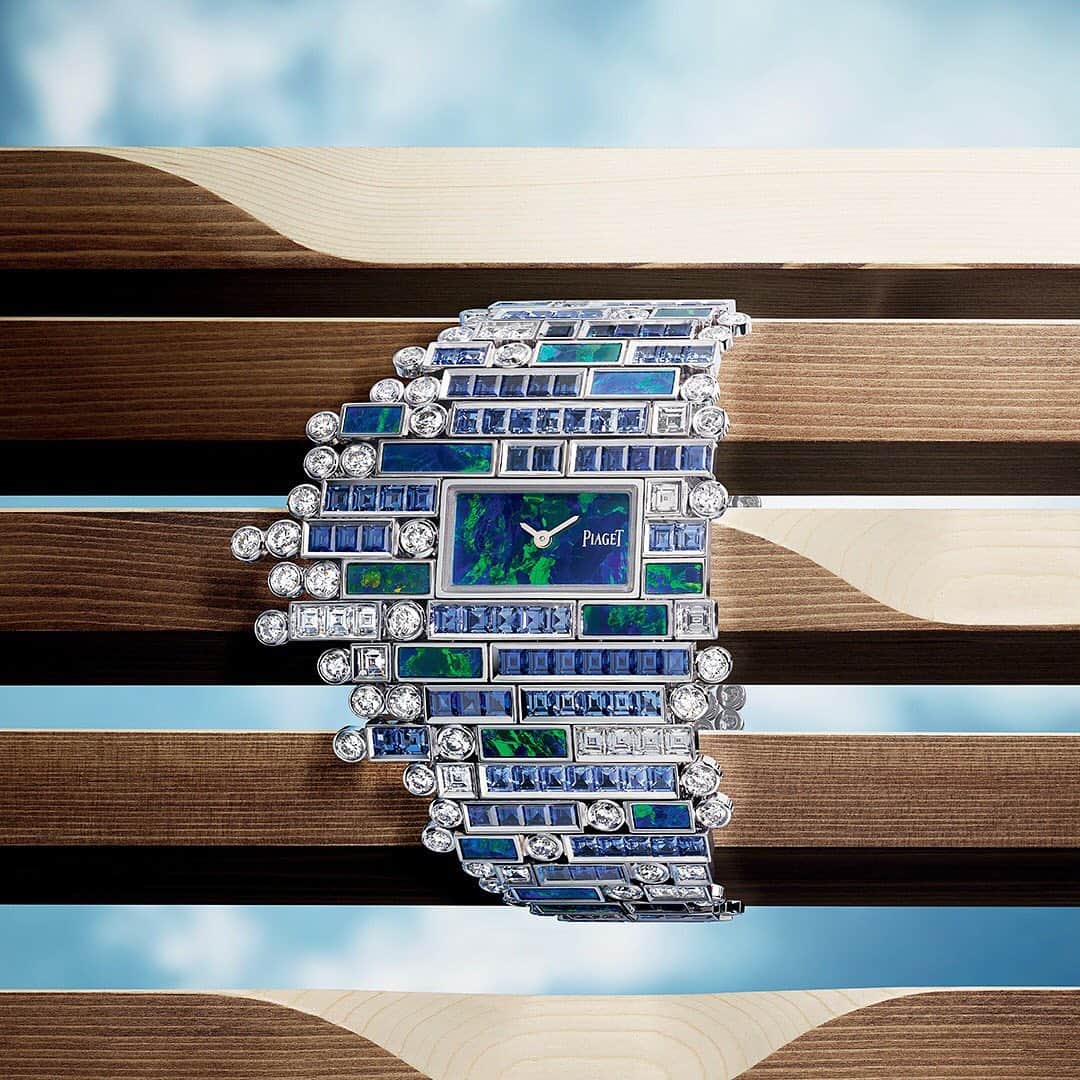 ピアジェさんのインスタグラム写真 - (ピアジェInstagram)「Piece by piece an 𝒆𝒏𝒄𝒉𝒂𝒏𝒕𝒊𝒏𝒈 creation is formed. Allow yourself to sink into the 𝒓𝒊𝒄𝒉 blue sea of over 150 sapphires and diamonds, carefully placed in an asymmetric layout surrounding the black opal dial. Discover our Secret Cenote cuff watch from the #PiagetWingsOfLight collection. - #Piaget #PiagetHighJewellery #SapphireWatch #CuffWatch #HighJewellery #HighJewelry」7月15日 1時45分 - piaget