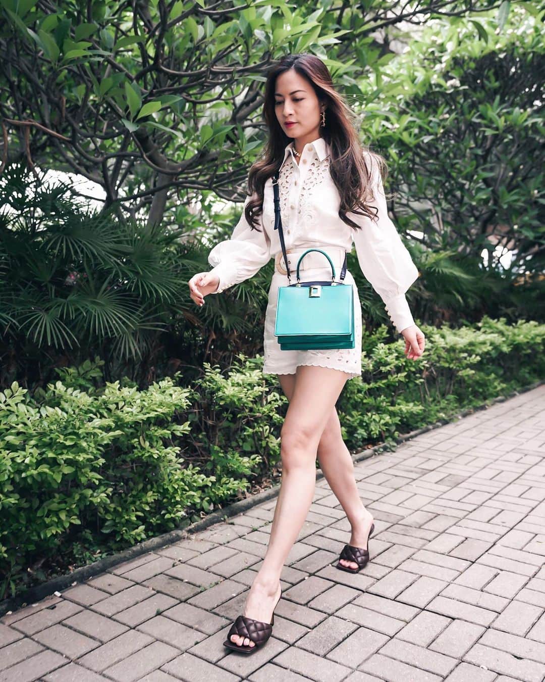 Ruby Kwanのインスタグラム：「We need to resume our social distancing measure. And there was a confirmed COVID-19 case at the same building of my home. 💪🏻💪🏻💪🏻 Fighting!!! Though we are distanced, we are not walking alone. 💚 #socialdistancing2020 #rougeclosetxrogervivier  Wardrobe: @zimmermann Peggy Embroidered shirt & shorts #zimmermann #ZimResortSwim20 Bag: @RogerVivier #RogerVivier #SoVivier @gherardofelloni #gherardofelloni Shoes: @bottegaveneta #bottegaveneta #paddedsandals 📷 @travisng5  http://liketk.it/2RD7m @liketoknow.it #liketkit」