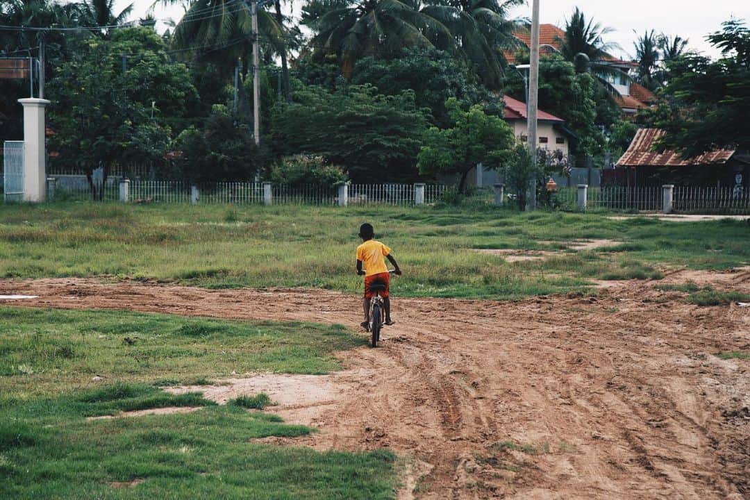Shunsuke Miyatakeのインスタグラム：「A boy riding on a bike, someday, somewhere in Cambodia」