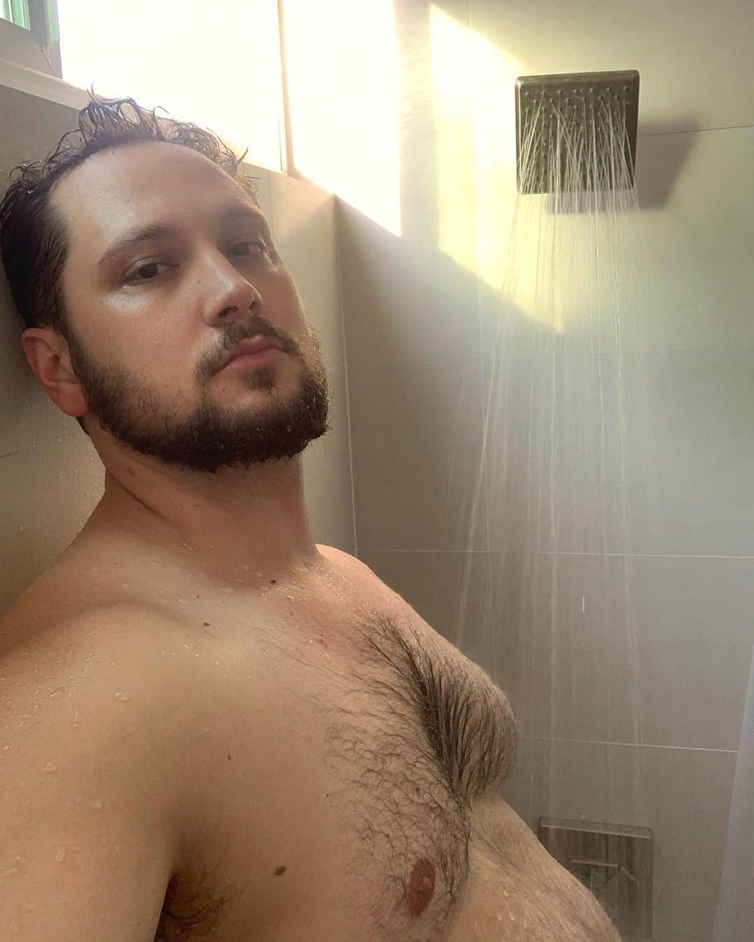 マット・マクゴリーのインスタグラム：「My big, soft belly. My earliest memories that my body was "wrong." A site of torment and trauma that taught me that I, myself, was shameful. Self-inflicting harm in the hope that it would protect me. From a world that hates fat people and men who are soft, physically and emotionally. "Casual" comments, and their impact that I tried to ignore. To acknowledge them fully, would mean being too soft in both body and spirit.  # My big, soft belly. As men, we must be hard and angular, like chiseled impenetrable statues. Unchanged by external conditions- seasons, quarantines, life events, traumas, systemic oppression and emotions. We are told that our bodies reflect our inner-state, and that we must always be in control. Of our lives, our emotions, "our women," and our bodies. We are taught that a lean and muscular physique is the prize of self-control and that this is worthy of unending obsession as we sacrifice our joy at the altars of these lifeless statues that we worship. All of the trauma, self-hate, self-punishing exercise and food restrictions I put on myself had to be worth it, right? The more the better. Resentful of friends who got "credit" for their leanness when they didn't have to harm themselves like I had in order to achieve it. Of course, I received some specialized awards for how dutifully I slit my throat and let the softness bleed out of me, as I watched myself harden to stone.  #  My big, soft belly. Bigger and softer than ever before. As my personhood and spirit blossoms and grows, my body and my belly does as well. Symbiotically, they support the growth of each other. As my healing takes deeper root, it supports me in growing in wild, uncontainable, and unknowable ways. What would be possible, if we could see the growth of our bodies as intricately connected to healing our our spirits, our relationships with our bodies, food, movement, and to the world around us?  # My dad's big, soft belly. Like mine. Too unique and beautiful to fit into the hard boxes created to contain soft men. I feel his pain, like I feel my own. My softness allows it. And he is gentle, kind, empathetic...soft. Our softness is magic. There is beauty in our softness.」