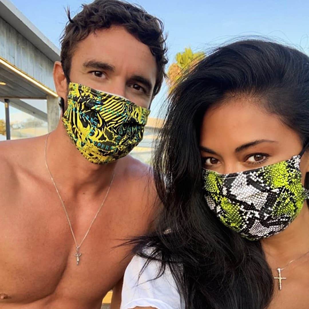 ジュリアンマクドナルドのインスタグラム：「The stunning @nicolescherzinger wearing a #JULIENMACDONALD Face Covering, designed with an exclusive JM snake Print, alongside the handsome @te11   These Reusable and Sustainable masks are a joint collaboration with @BritishFashionCouncil,  with 100% of profits going to charities.  Available to buy now at @bootsuk, @sainsburys,  @johnlewisandpartners and @asos   @bagsofethics」