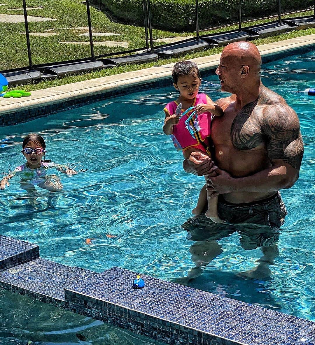 ドウェイン・ジョンソンさんのインスタグラム写真 - (ドウェイン・ジョンソンInstagram)「My pool days = Tia just wanting “daddy hold me” while I walk around inside the pool with her and Jazzy (resurfacing to catch her breath) swims up and bites my legs because “the shark has to kill the big monster” 👹🦈 🤷🏽‍♂️ Enjoy your families and stay healthy, my friends.  #quarantinesilverblessings  #thebigmonster」7月18日 9時19分 - therock